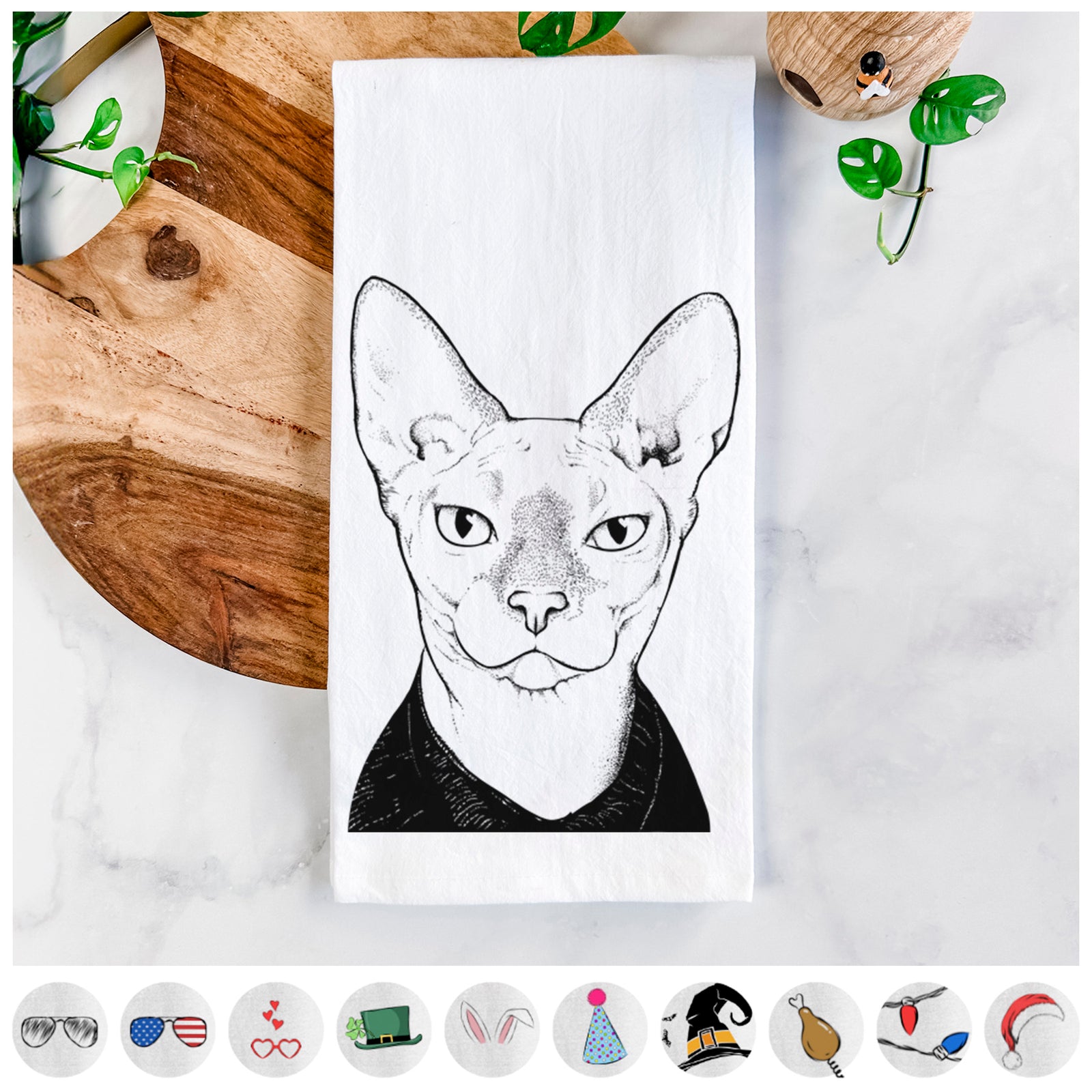 Hand-drawn sketch of Oliver Watson the Sphynx Cat on a tea towel, shown with icons of the other available costume styles
