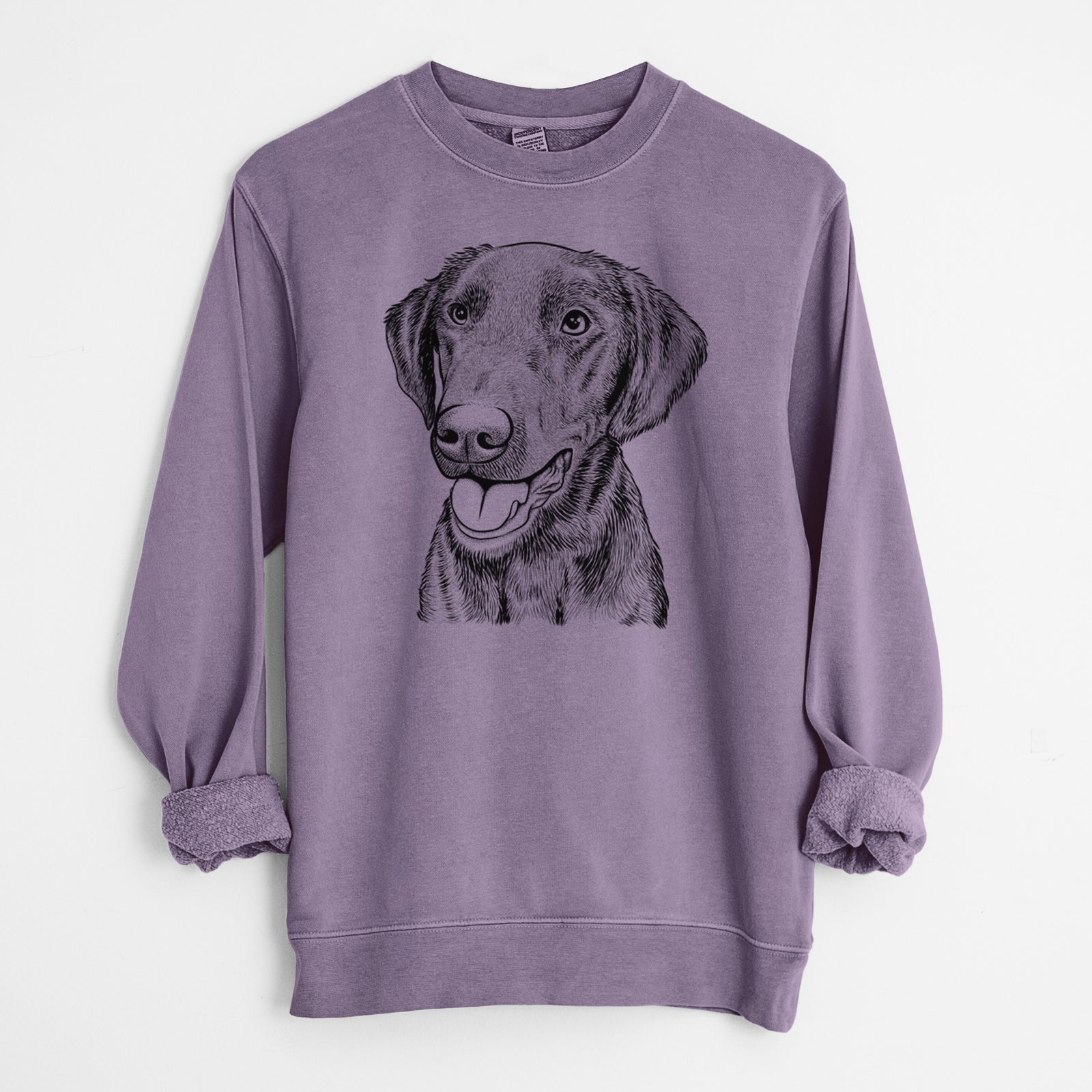 Hand-drawn sketch of Onyx the Labrador Retriever on a Plum Unisex pigment dyed crew sweatshirt