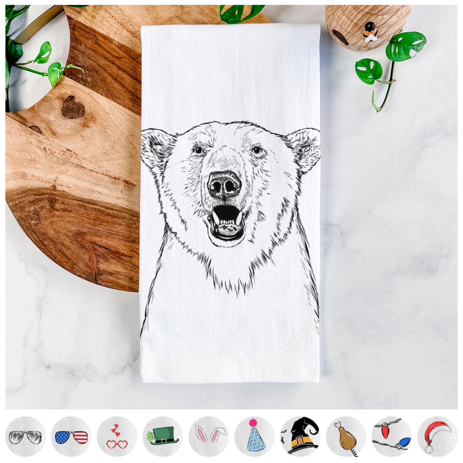 Hand-drawn sketch of Oslo the Polar Bear on a tea towel, shown with icons of the other available costume styles