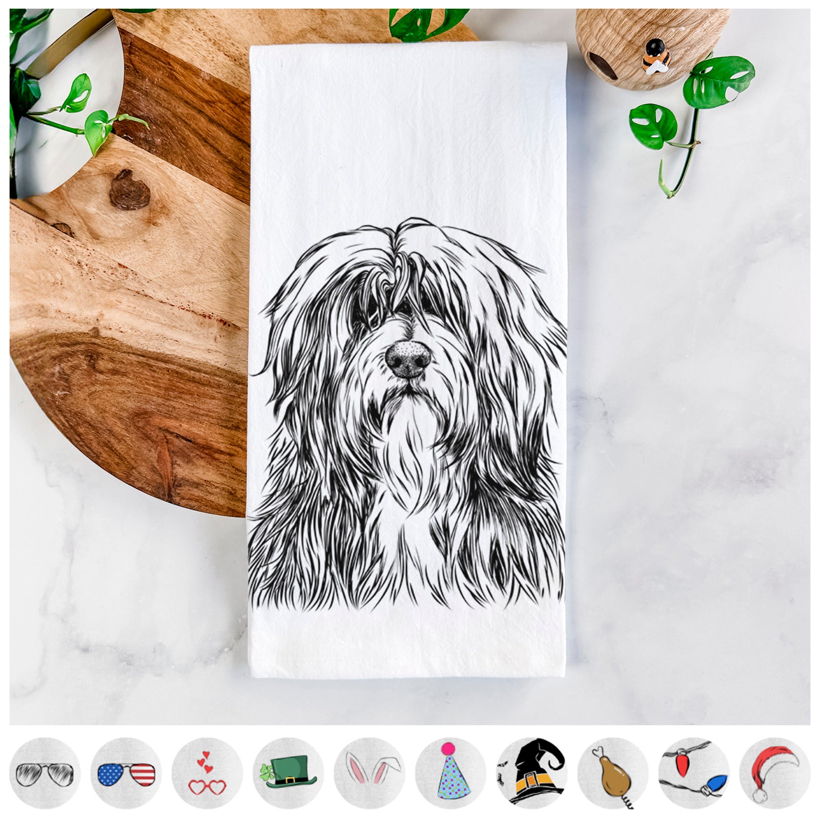 Hand-drawn sketch of Otto the Polish Lowland Sheepdog on a tea towel, shown with icons of the other available costume styles