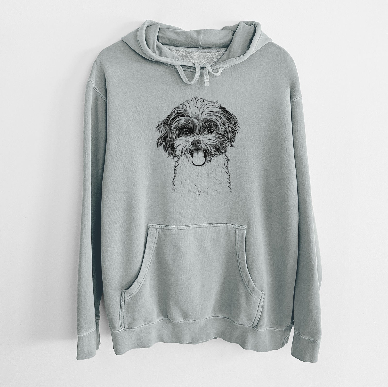 Hand-drawn sketch of Pepper the Shihpoo on a Sage Unisex pigment dyed hoodie