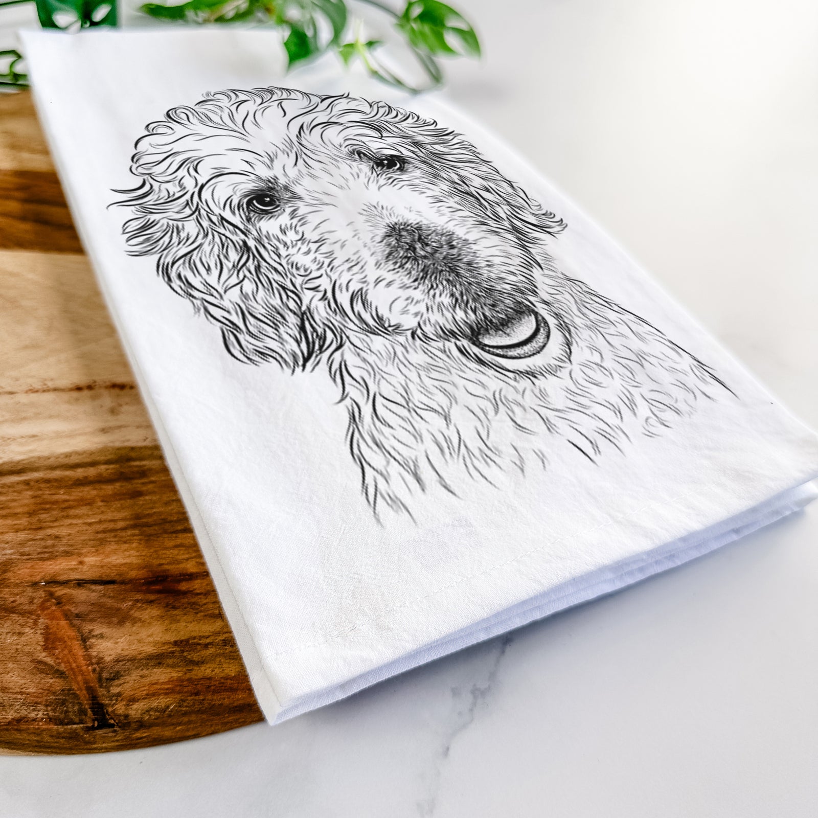 Hand-drawn sketch of Preston the Labradoodle on a tea towel