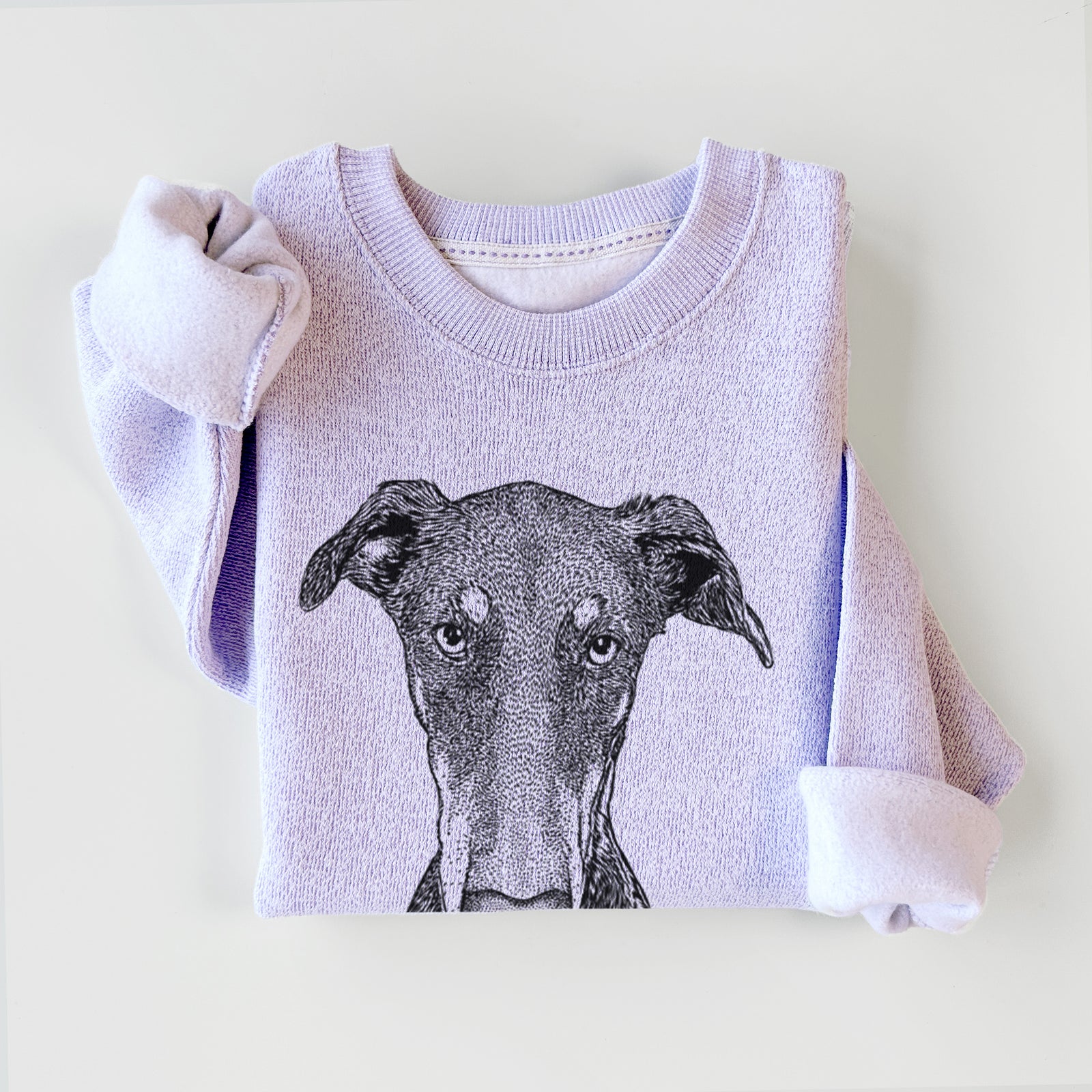 Hand-drawn sketch of Princess Fiona the Doberman Pinscher on an Ice Purple knit sweatshirt