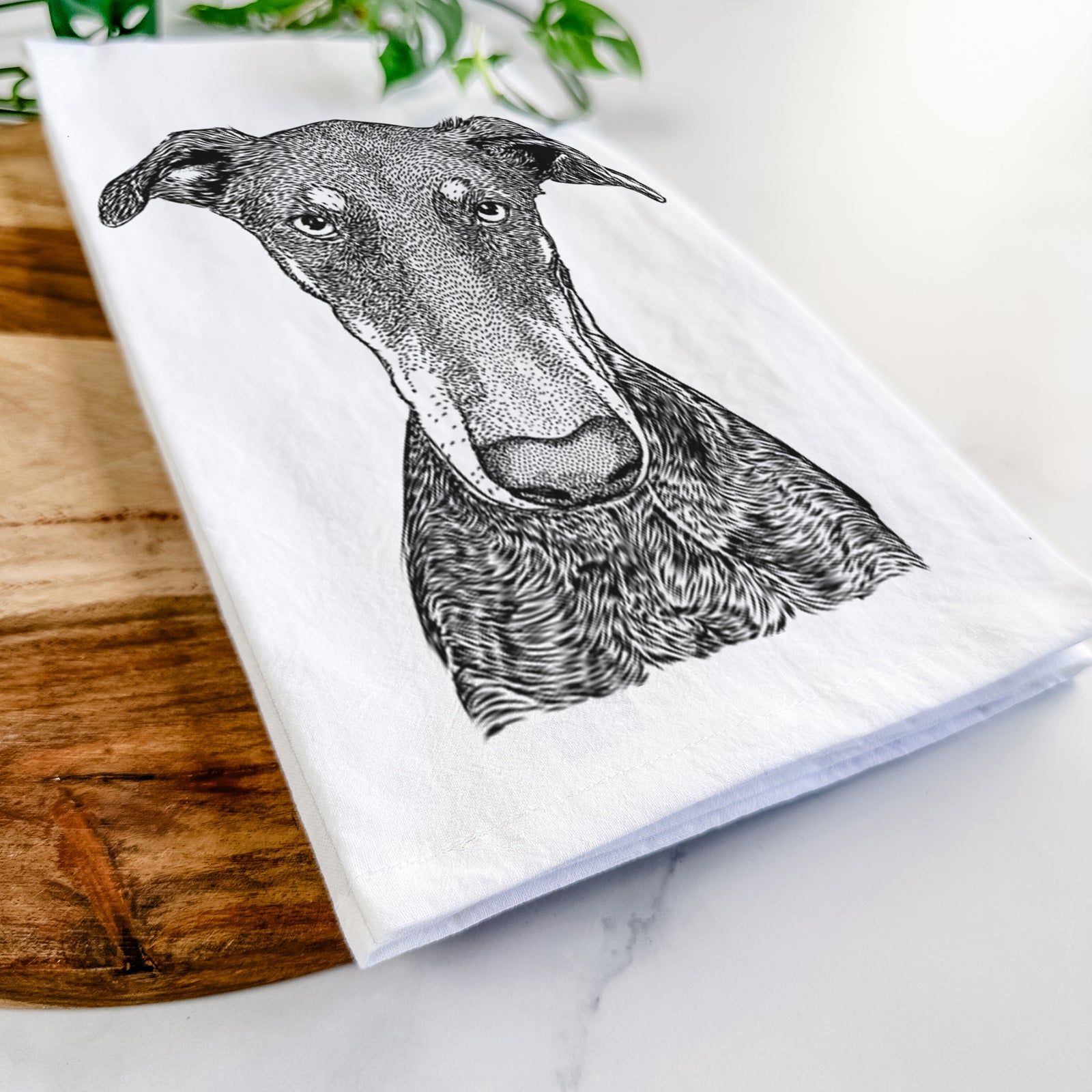 Hand-drawn sketch of Princess Fiona the Doberman Pinscher on a tea towel
