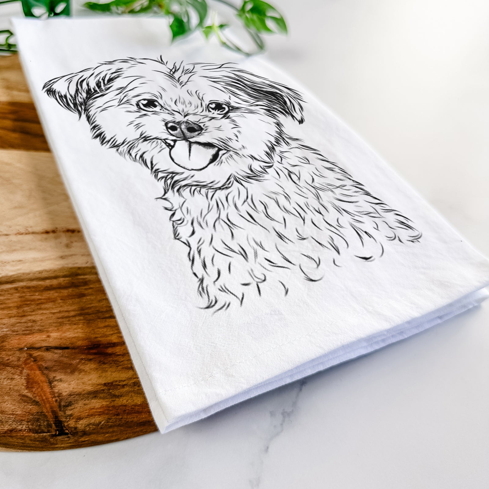 Hand-drawn sketch of Puff the Malshi on a tea towel
