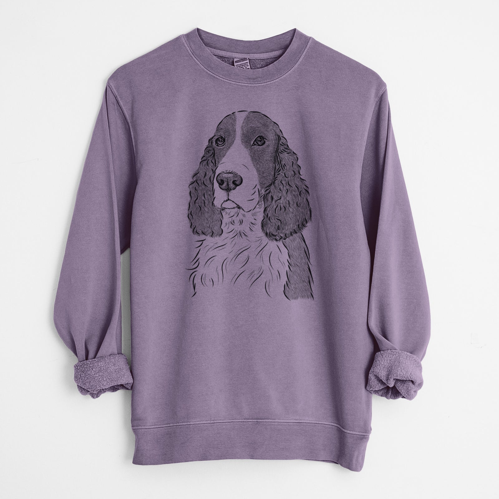 Hand-drawn sketch of Quincy the English Springer Spaniel on a Plum Unisex pigment dyed crew sweatshirt