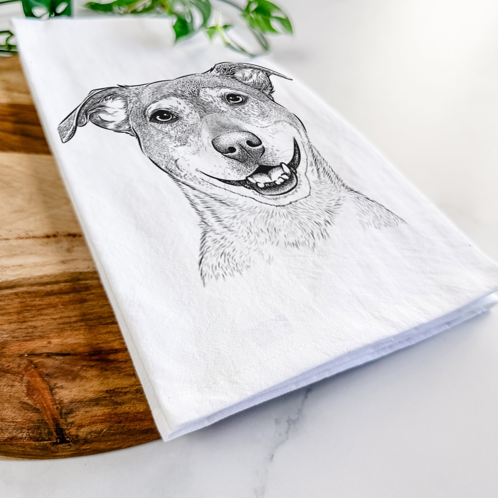 Hand-drawn sketch of Reese the Mountain Cur on a tea towel