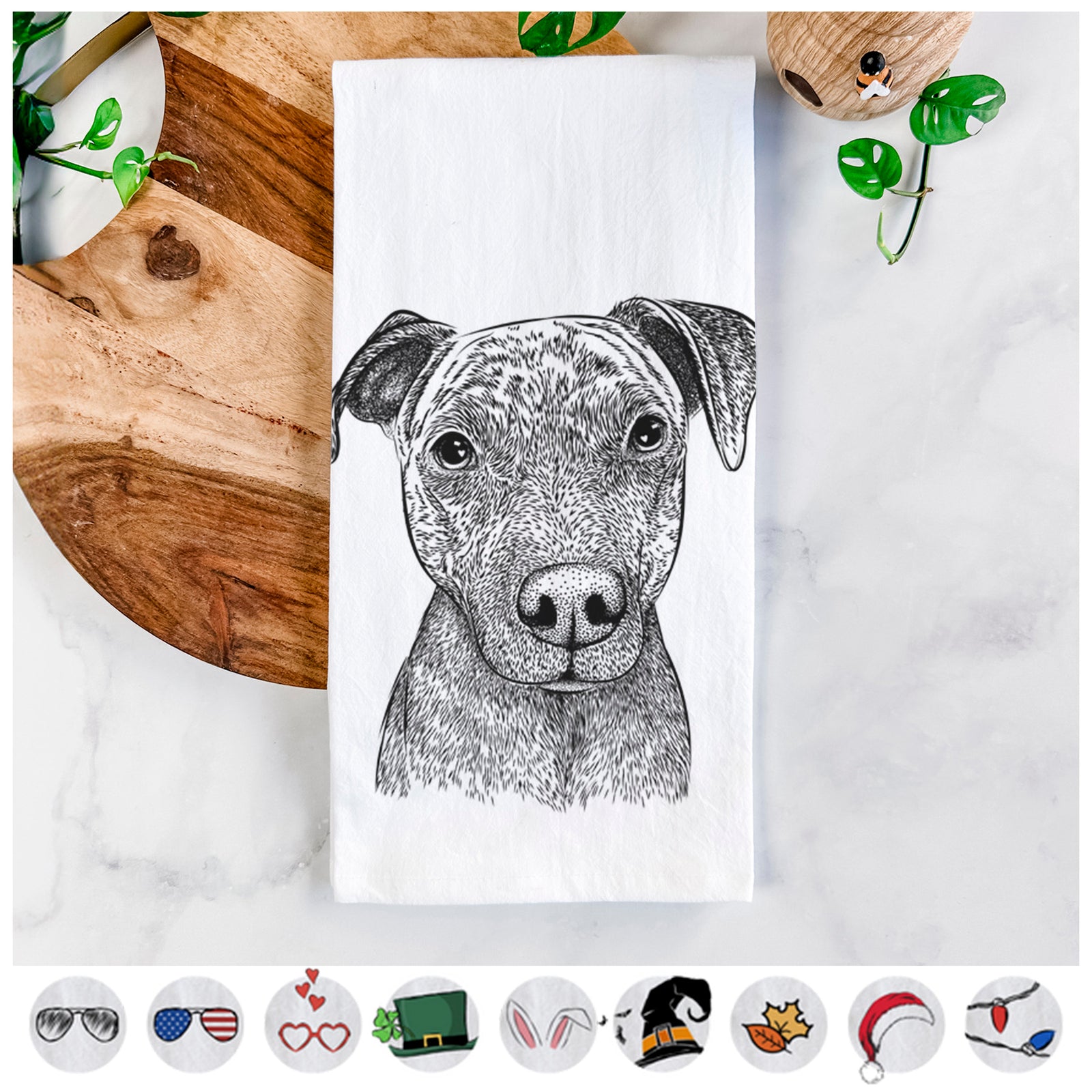 Hand-drawn sketch of Reeses the Pitbull on a tea towel, shown with icons of the other available costume styles