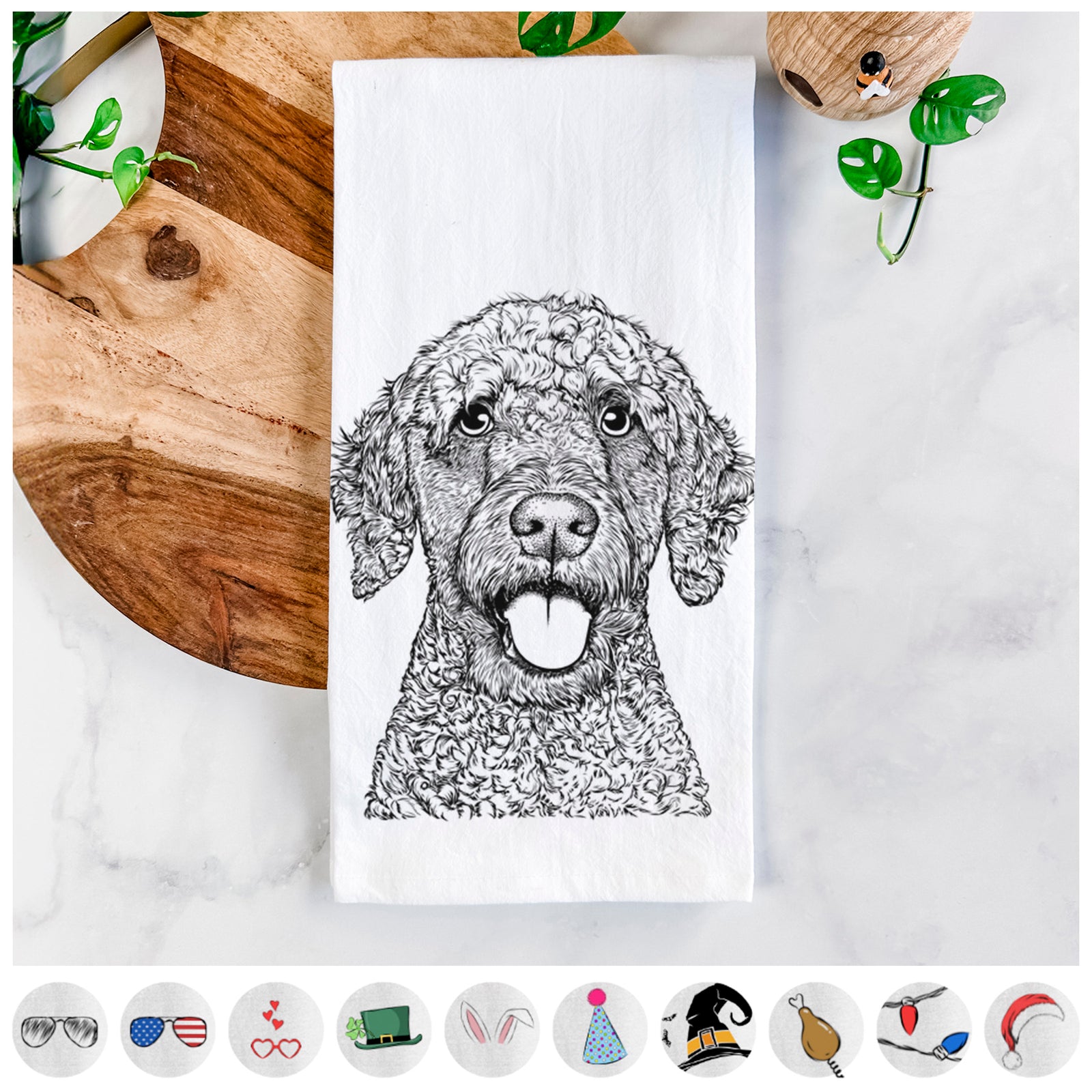 Hand-drawn sketch of Reina the Spanish Water Dog on a tea towel, shown with icons of the other available costume styles