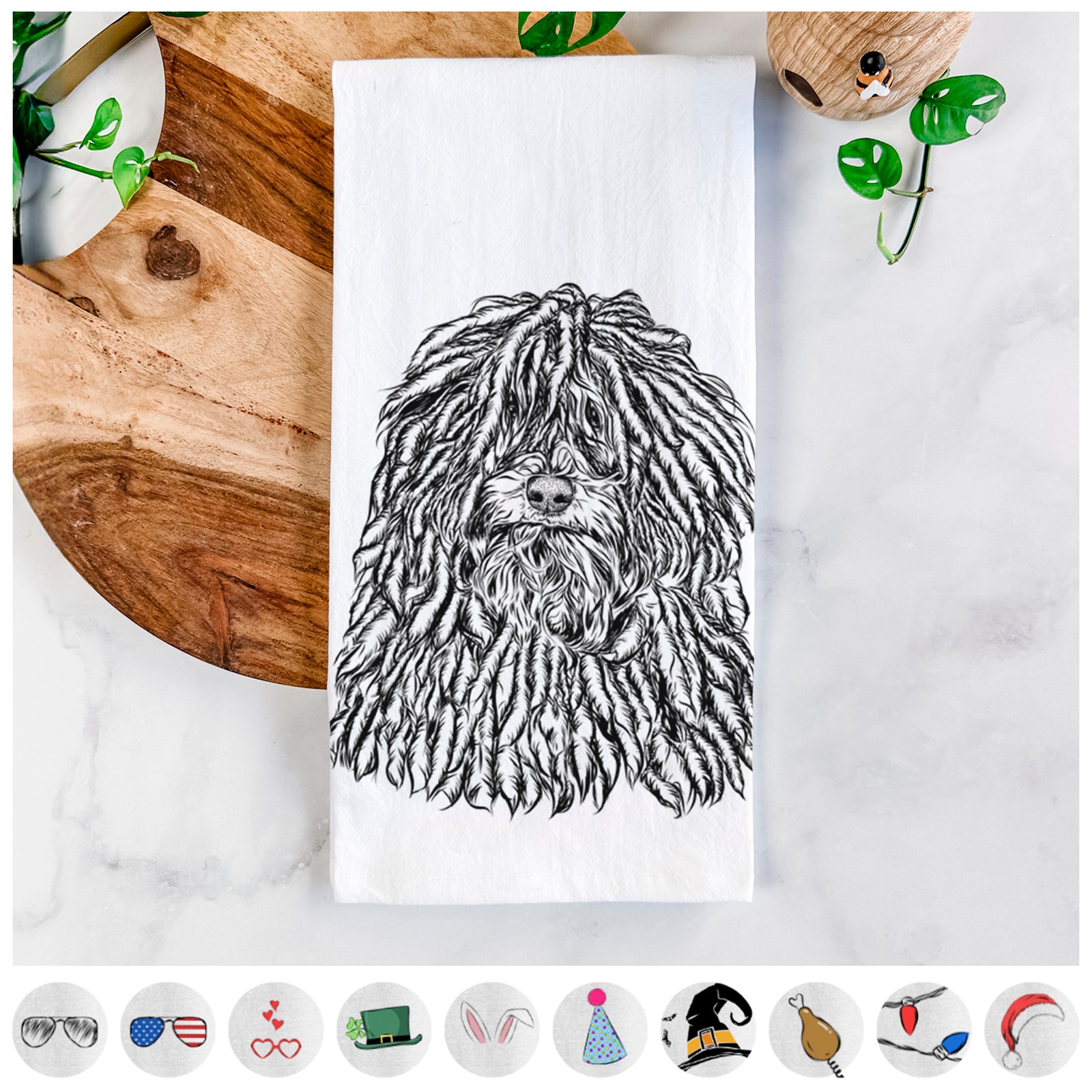 Hand-drawn sketch of Rezi the Puli on a tea towel, shown with icons of the other available costume styles