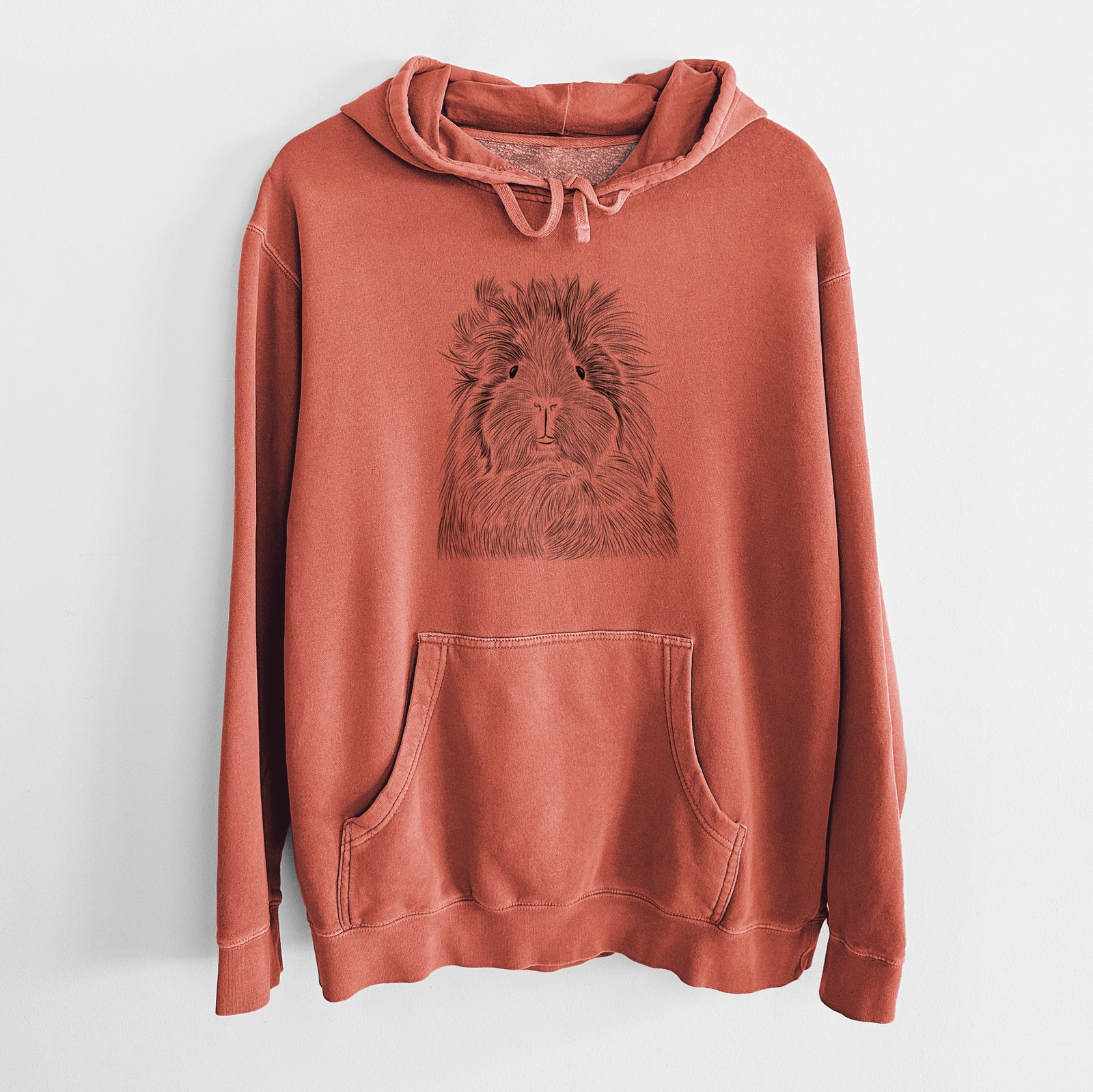 Hand-drawn sketch of Rhino the Guinea Pig on an Amber Unisex pigment dyed hoodie