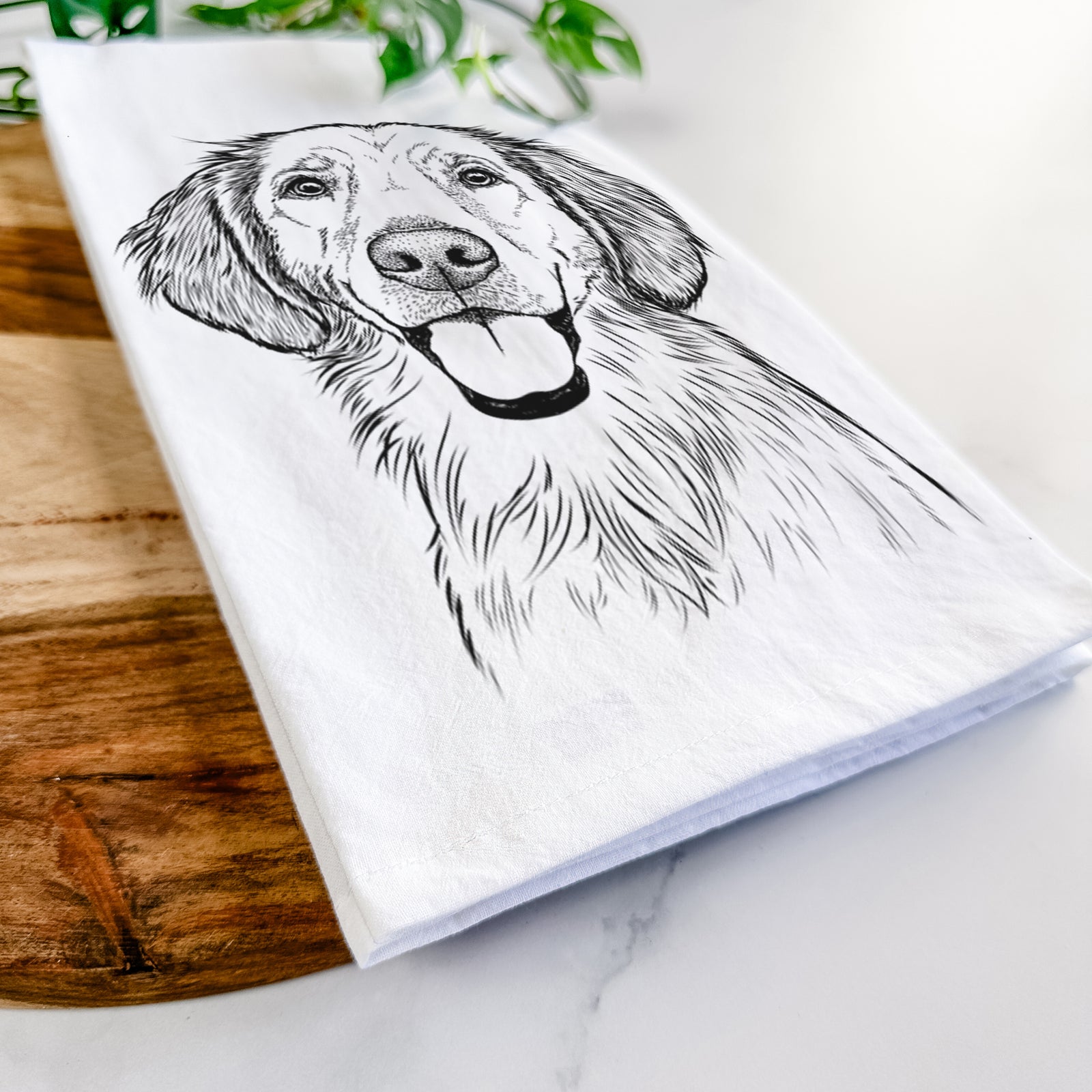 Hand-drawn sketch of Riley the Golden Retriever on a tea towel