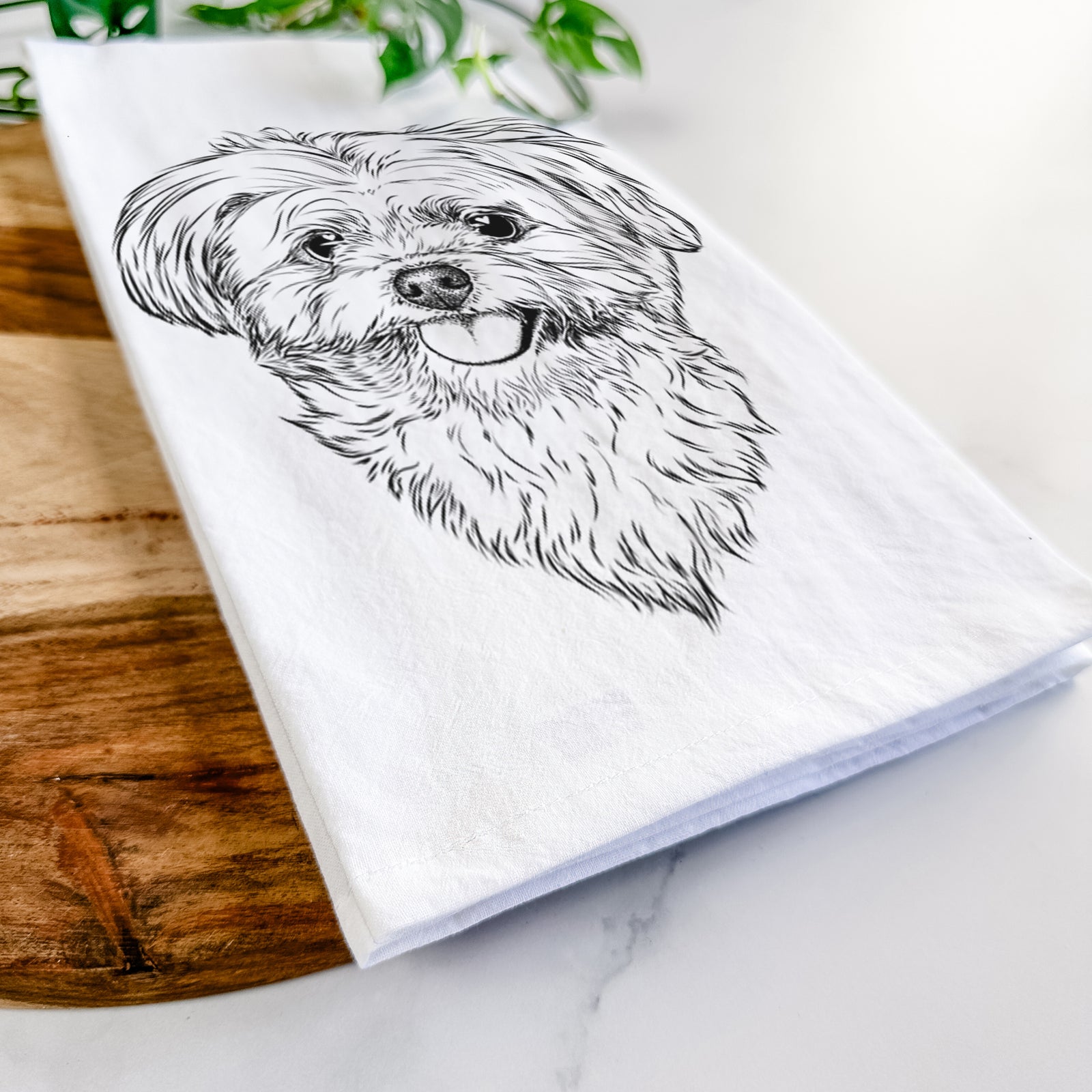 Hand-drawn sketch of Rosie the Maltipoo on a tea towel
