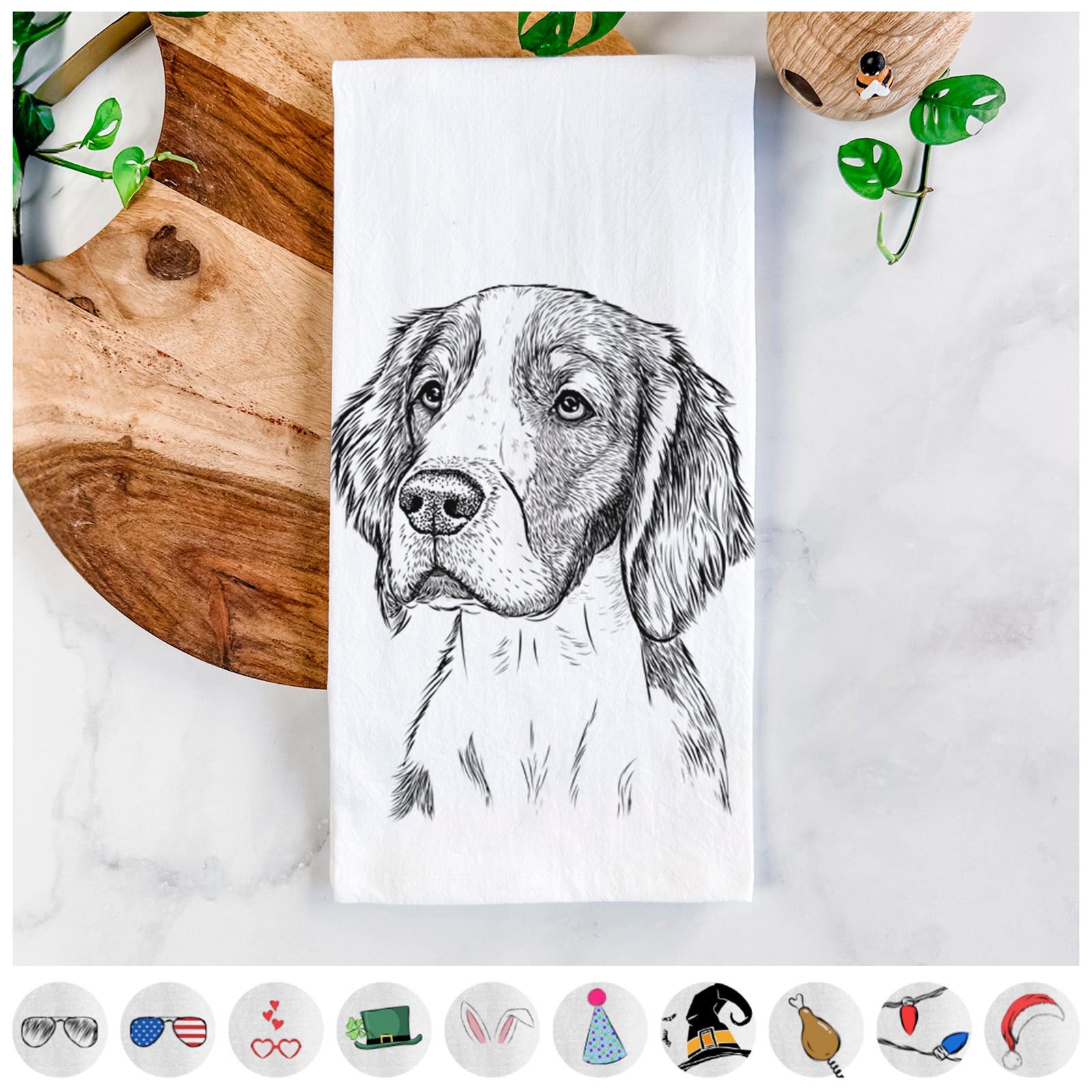 Hand-drawn sketch of Roxy the Welsh Springer Spaniel on a tea towel, shown with icons of the other available costume styles