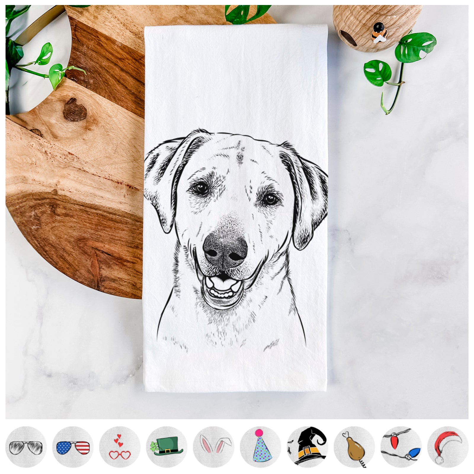 Hand-drawn sketch of Rusty the Labrador Retriever on a tea towel, shown with icons of the other available costume styles