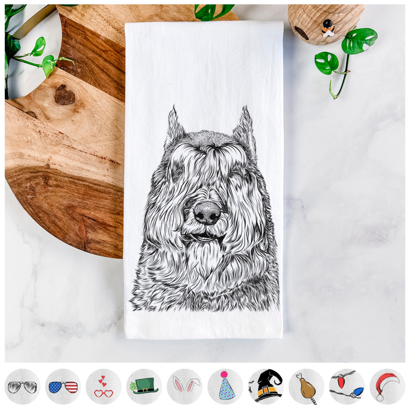 Hand-drawn sketch of Sabre the Bouvier Des Flandres on a tea towel, shown with icons of the other available costume styles
