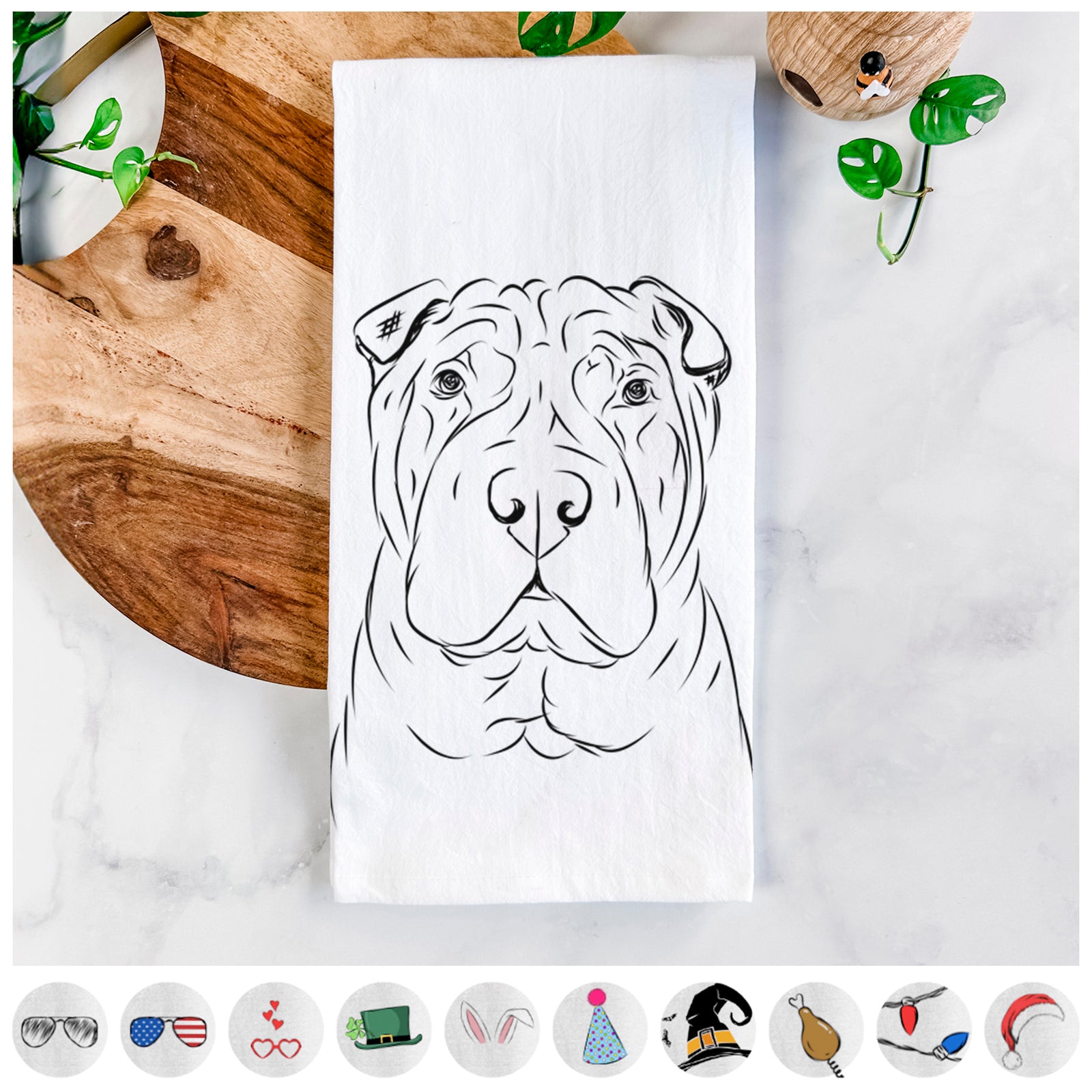 Hand-drawn sketch of Sharpy the Shar Pei on a tea towel, shown with icons of the other available costume styles