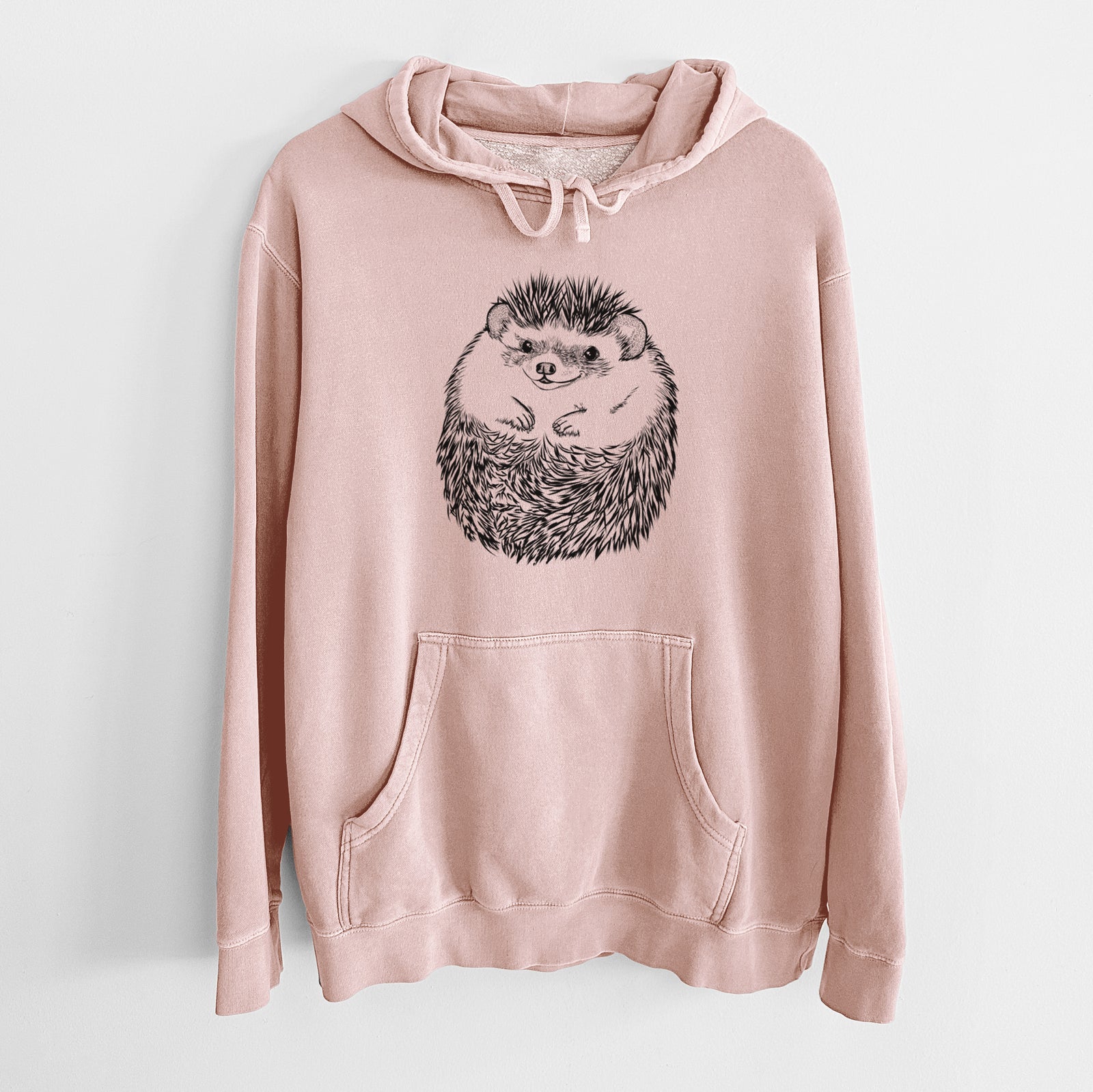 Hand-drawn sketch of Sid the Hedgehog on a Dusty Pink Unisex pigment dyed hoodie