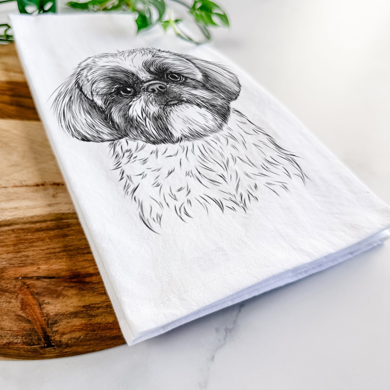 Hand-drawn sketch of Simon the Shih Tzu on a tea towel