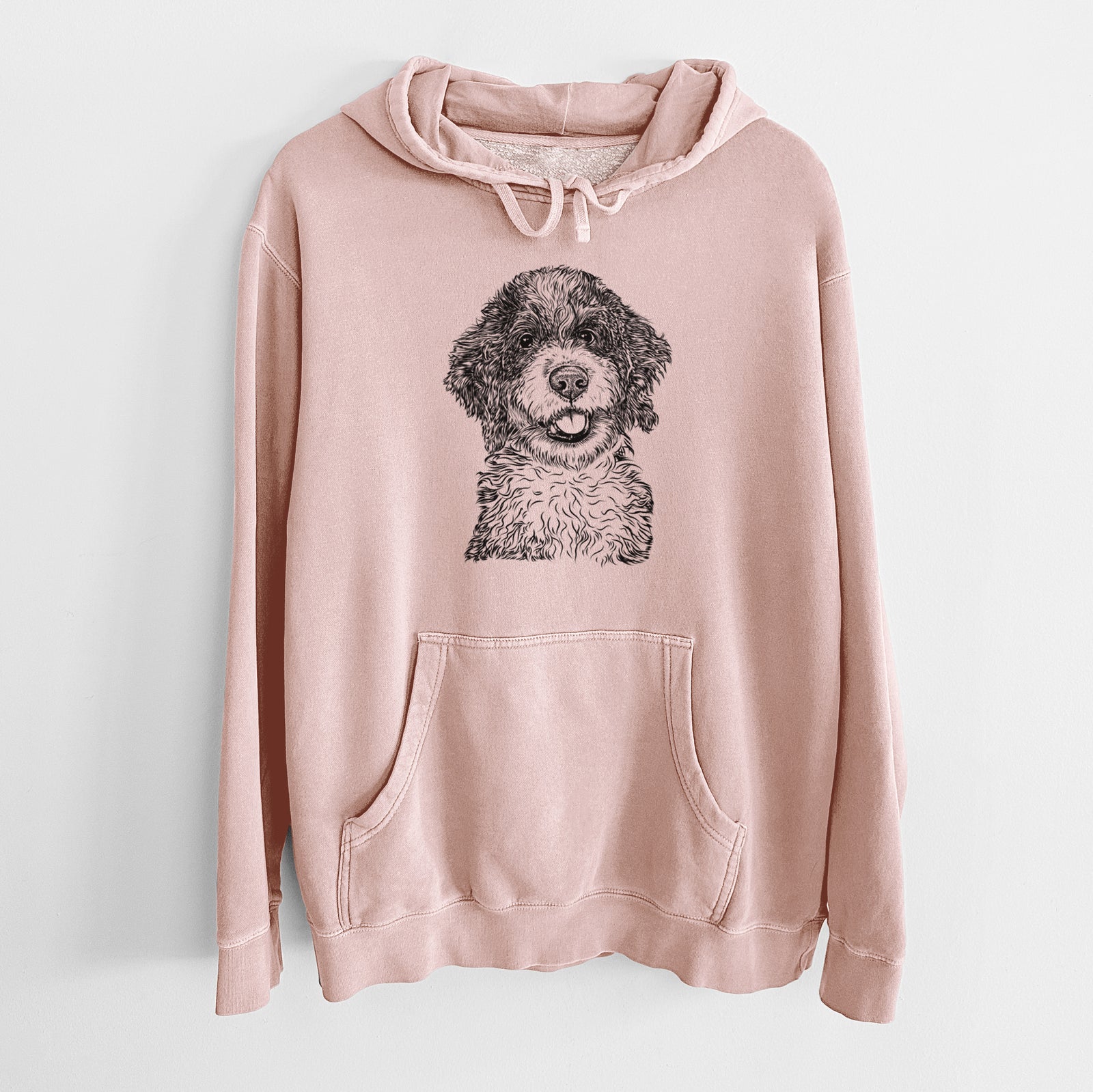 Hand-drawn sketch of Smoky the Bernedoodle Puppy on a Dusty Pink Unisex pigment dyed hoodie
