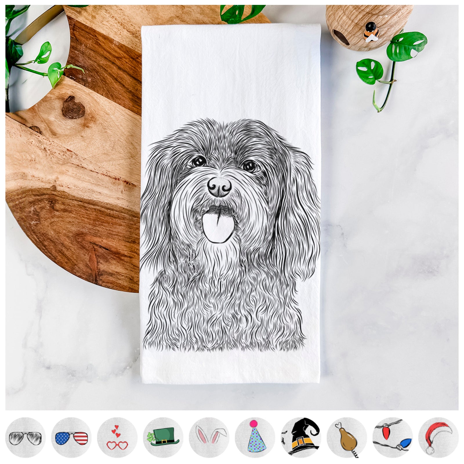 Hand-drawn sketch of Sophie the Havanese on a tea towel, shown with icons of the other available costume styles
