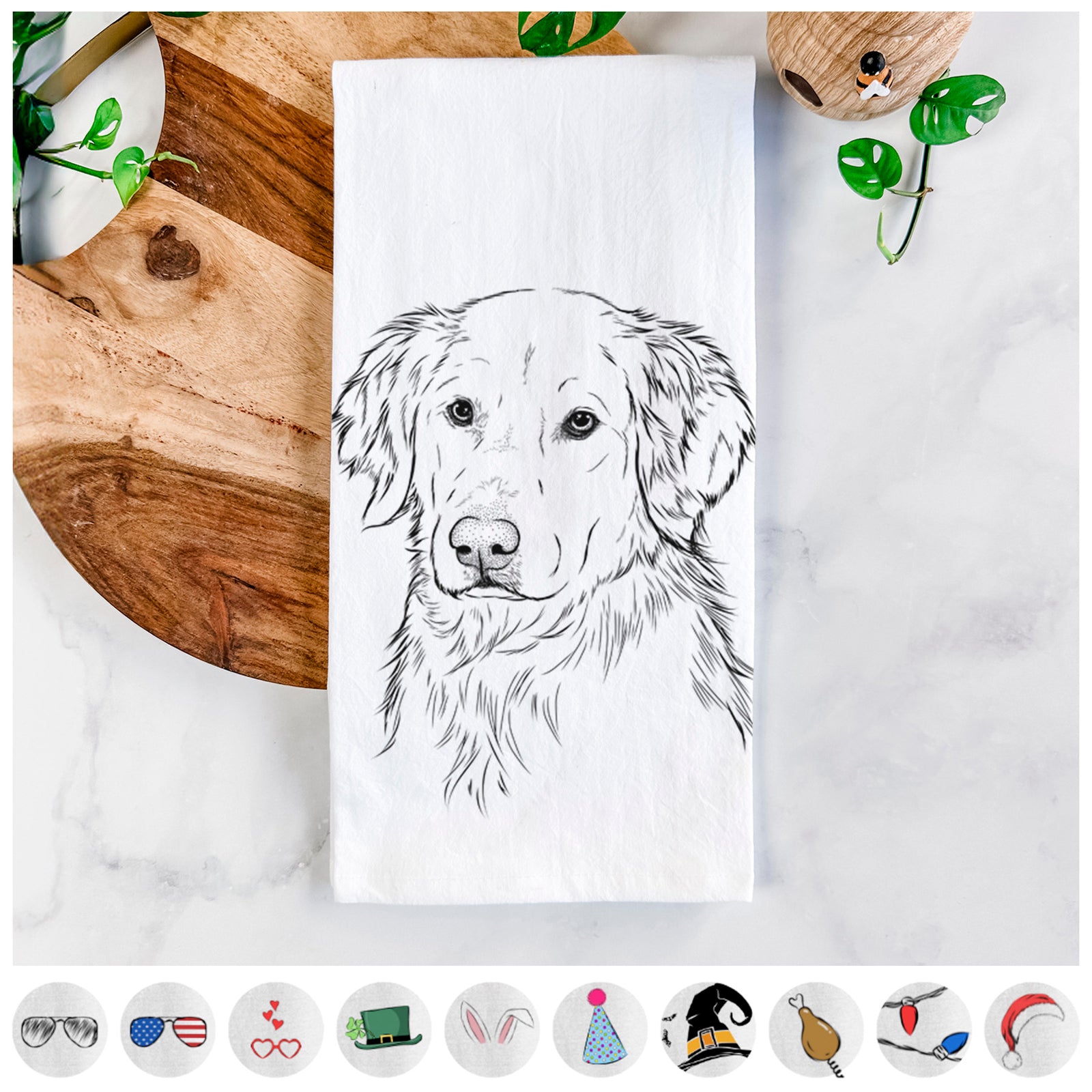Hand-drawn sketch of Spencer the Golden Retriever on a tea towel, shown with icons of the other available costume styles