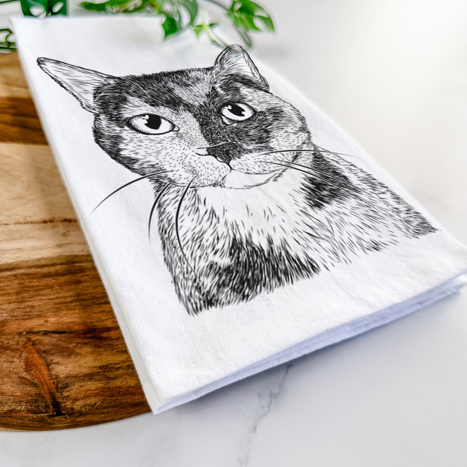 Hand-drawn sketch of Spooky Kitty the Tortoiseshell Cat on a tea towel
