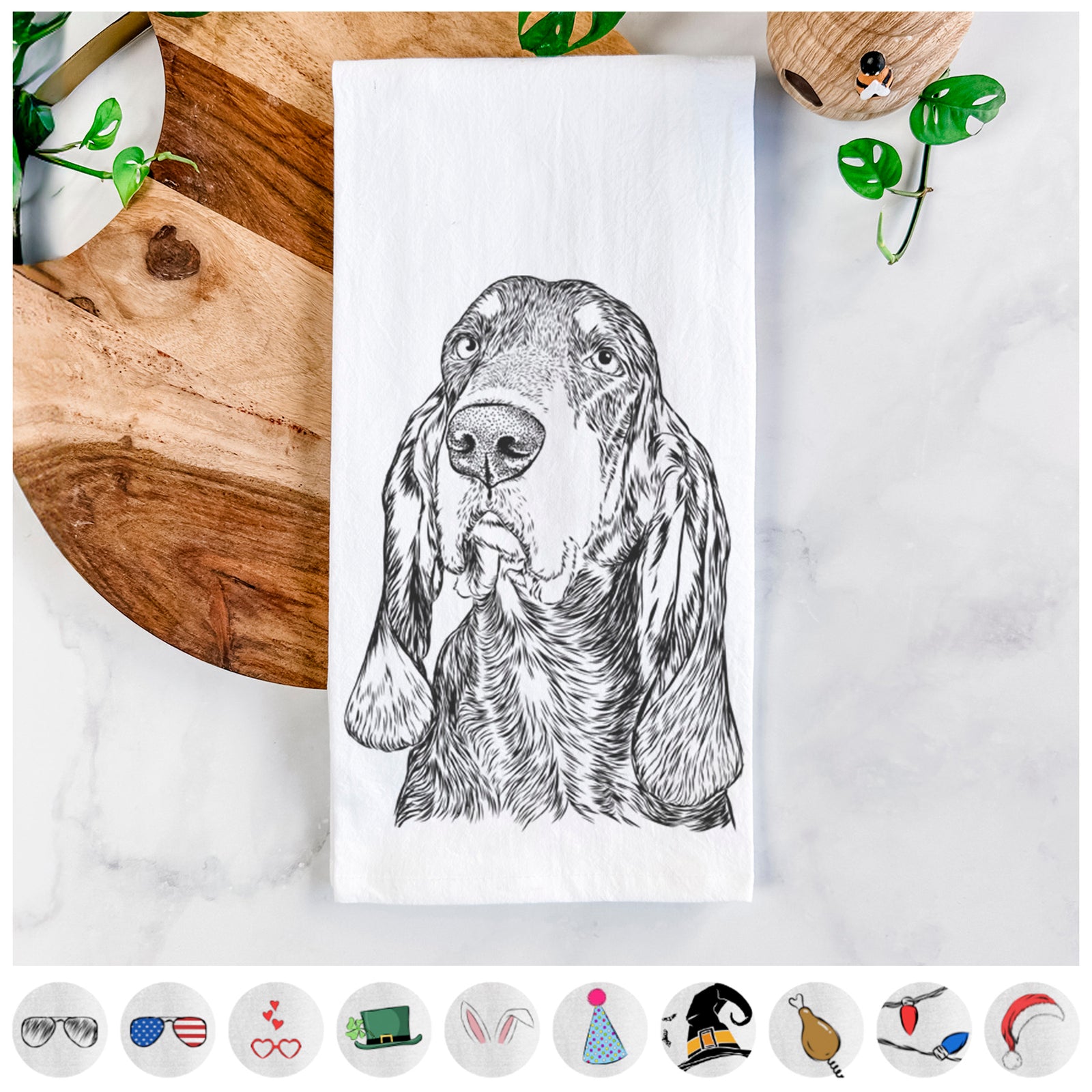 Hand-drawn sketch of Stu the Black and Tan Coonhound on a tea towel, shown with icons of the other available costume styles