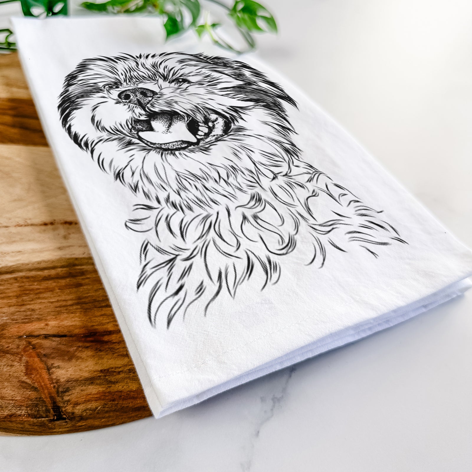 Hand-drawn sketch of Sugar the Malshi on a tea towel