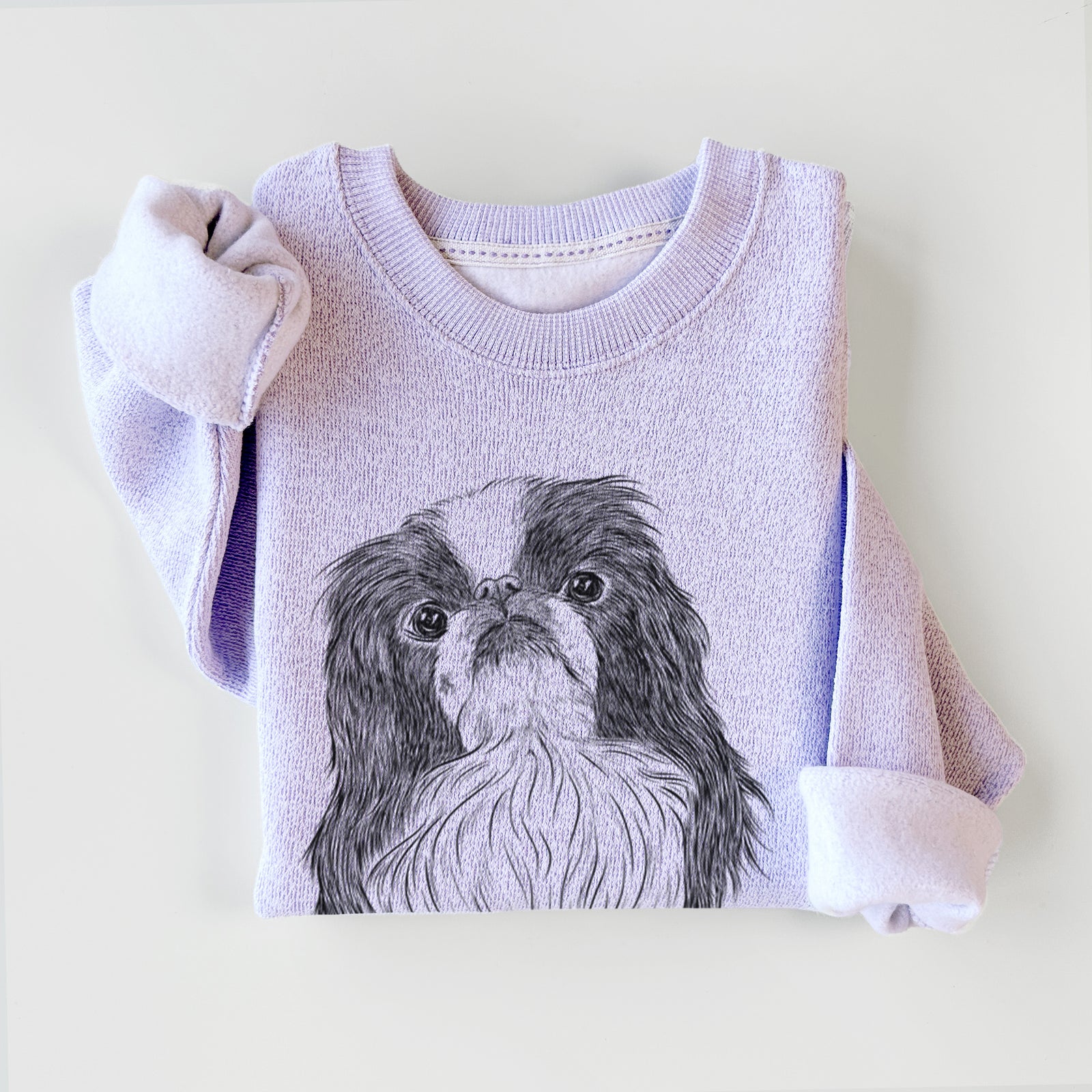 Hand-drawn sketch of Suki the Japanese Chin on an Ice Purple knit sweatshirt