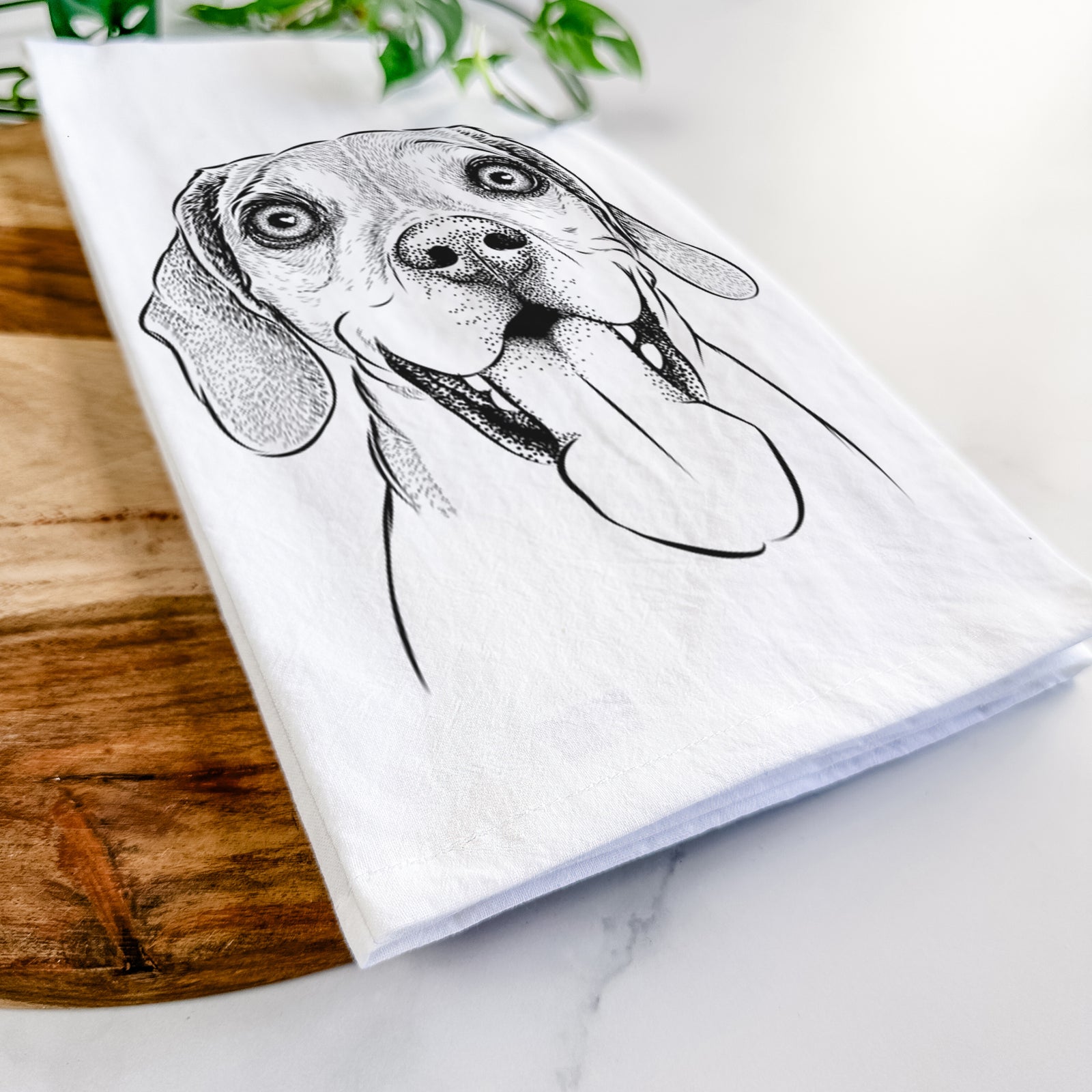 Hand-drawn sketch of Sunny the Beagle on a tea towel