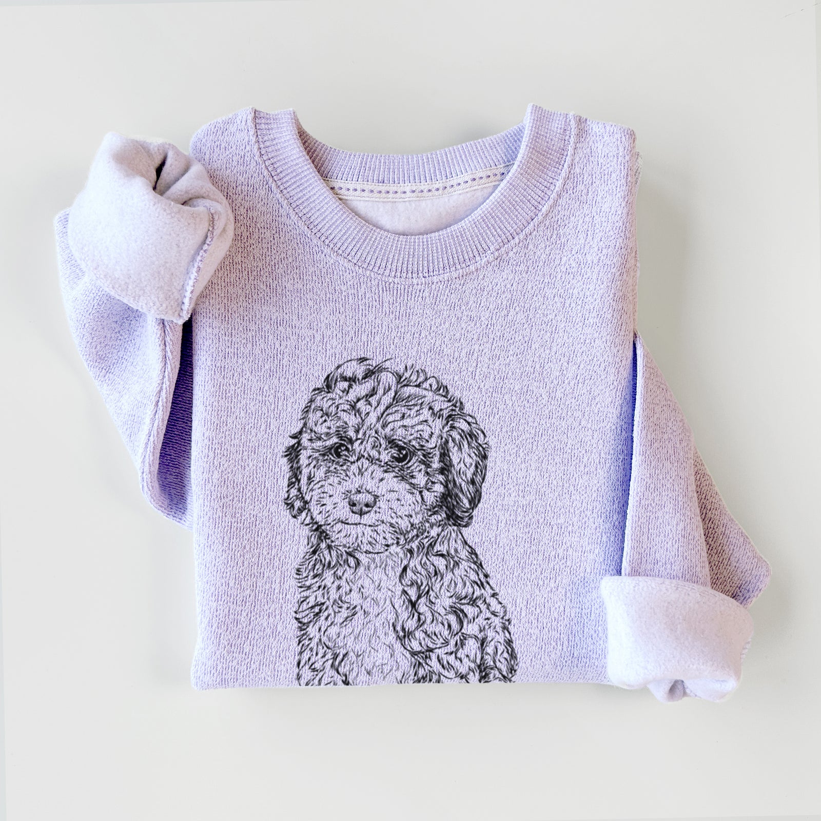 Hand-drawn sketch of Sweet Tea the Mini Doodle on an Ice Purple knit sweatshirt