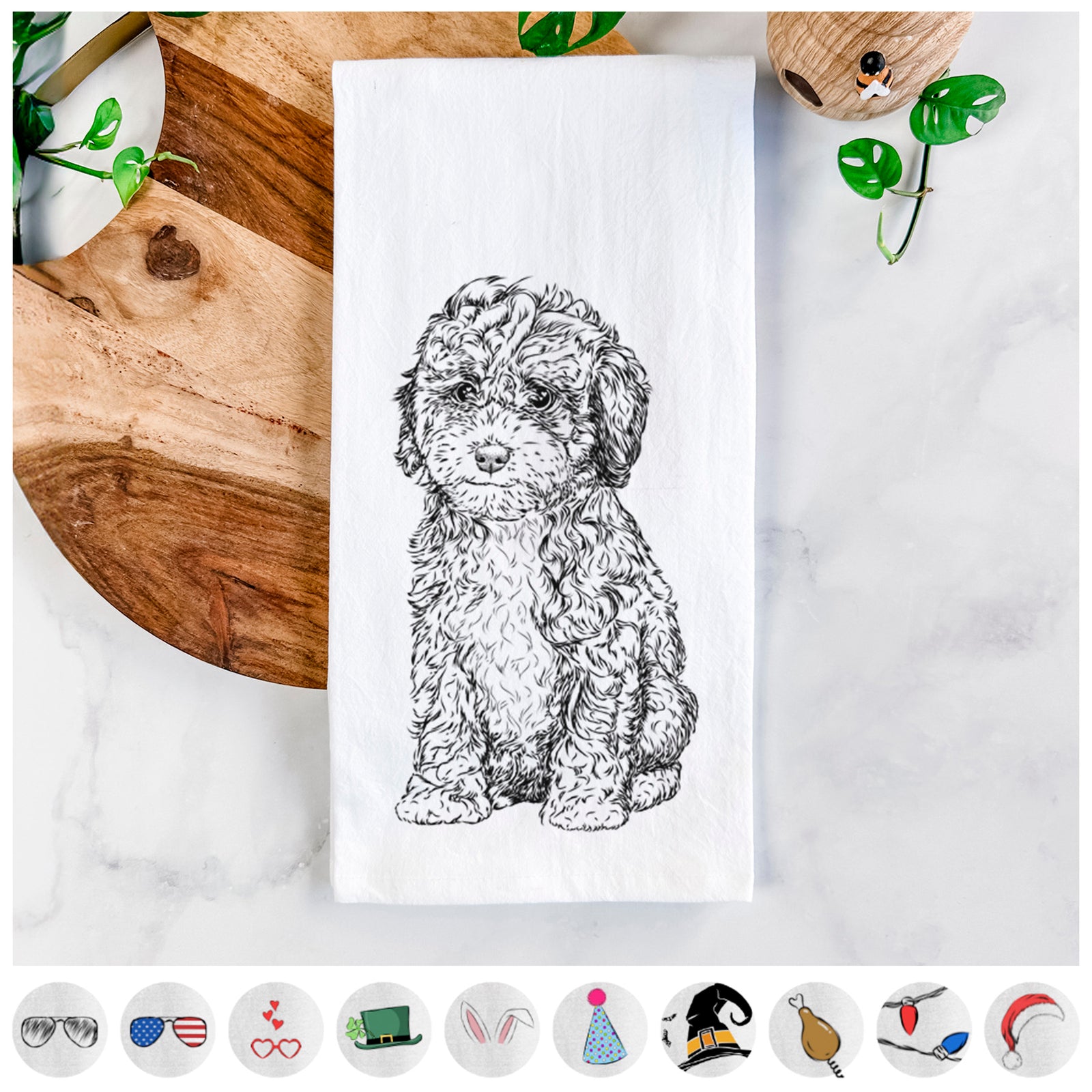 Hand-drawn sketch of Sweet Tea the Mini Doodle on a tea towel, shown with icons of the other available costume styles