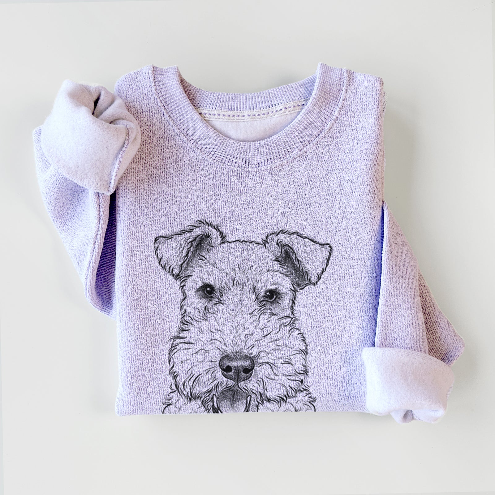 Hand-drawn sketch of Ted the Wire Fox Terrier on an Ice Purple knit sweatshirt