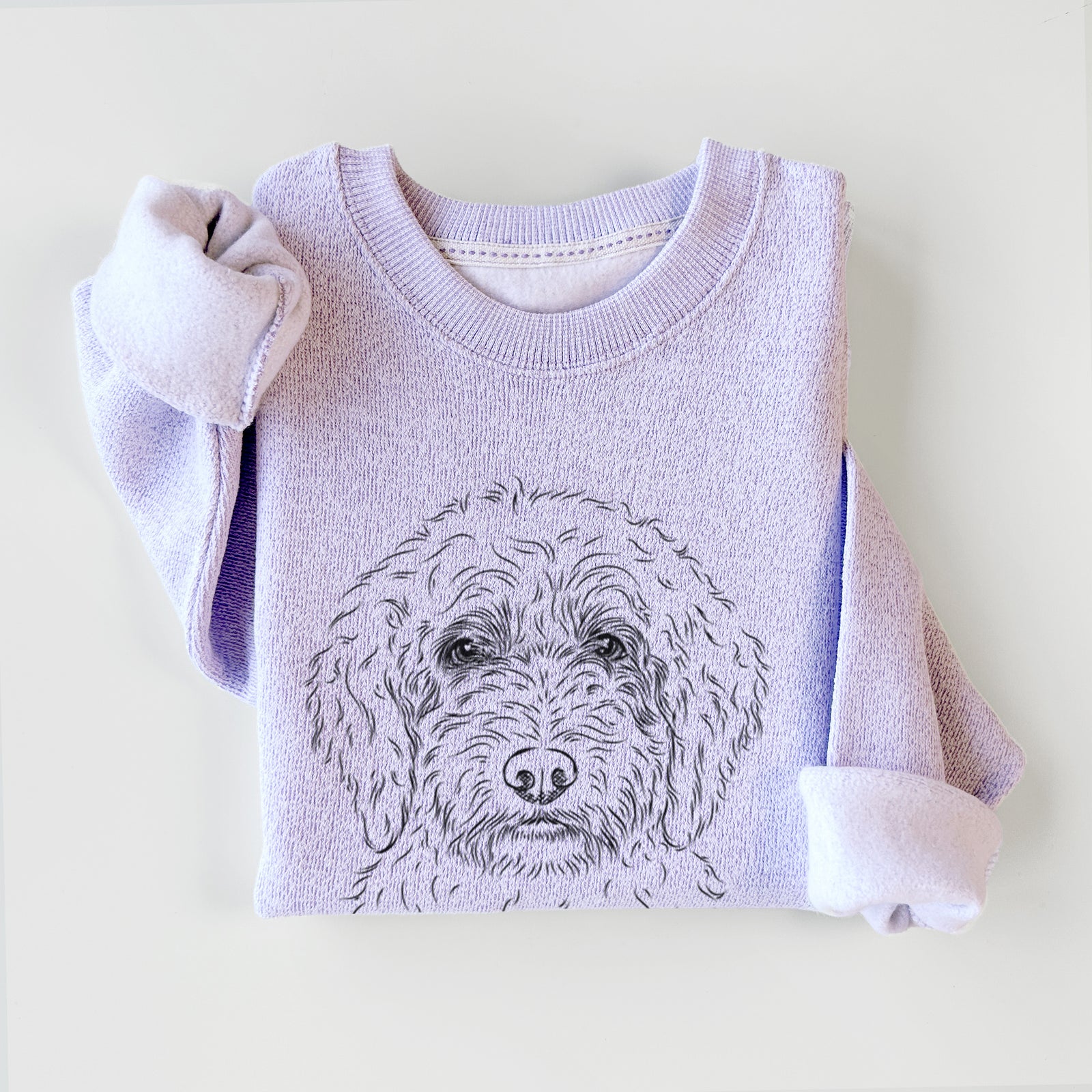 Hand-drawn sketch of Teddy the Labradoodle on an Ice Purple knit sweatshirt