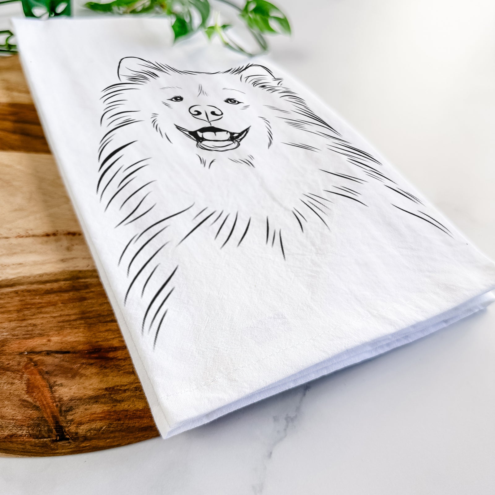 Hand-drawn sketch of Tillie the Samoyed on a tea towel
