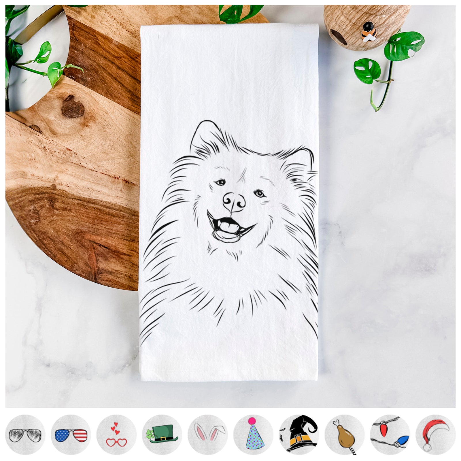 Hand-drawn sketch of Tillie the Samoyed on a tea towel, shown with icons of the other available costume styles