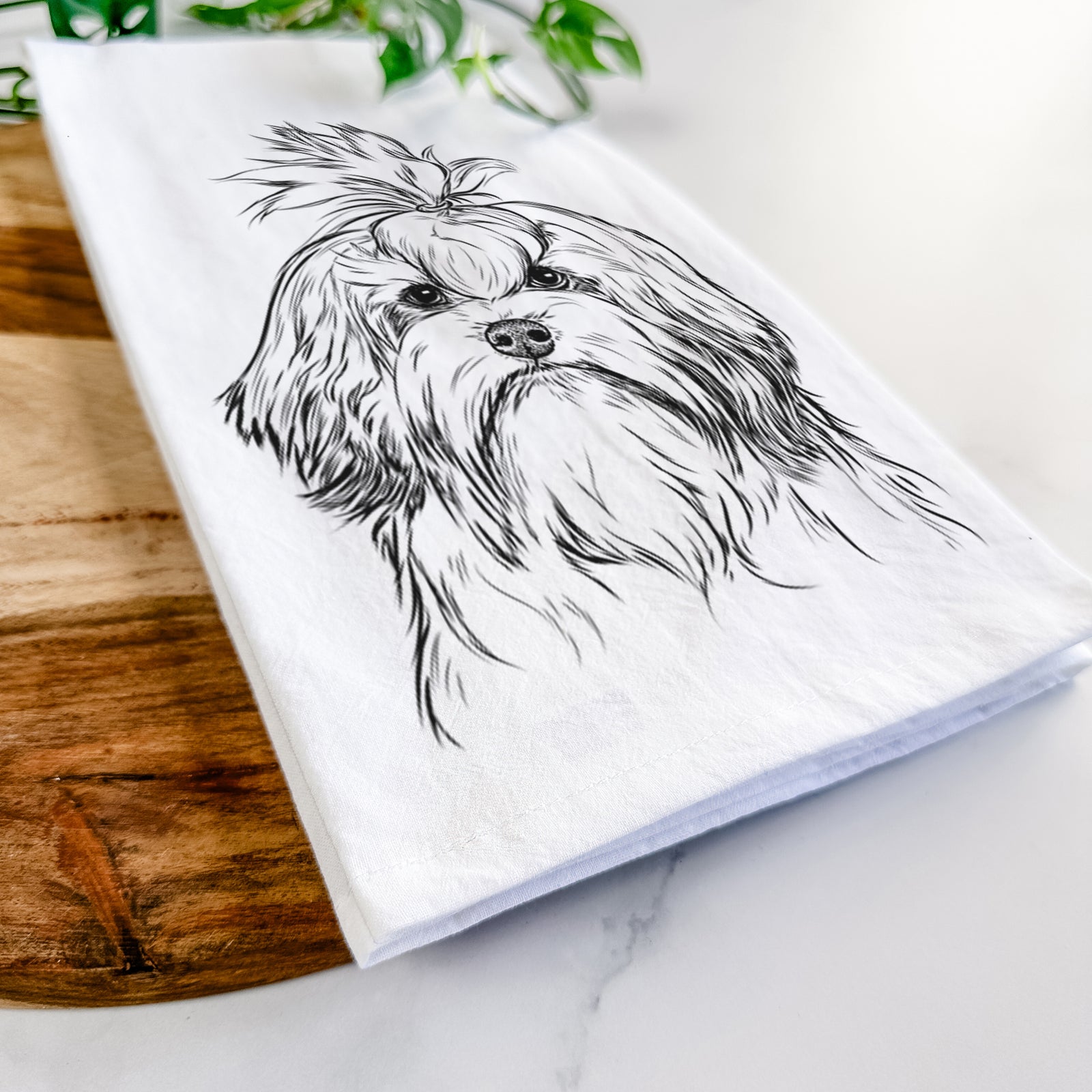 Hand-drawn sketch of Tootsie the Lowchen on a tea towel