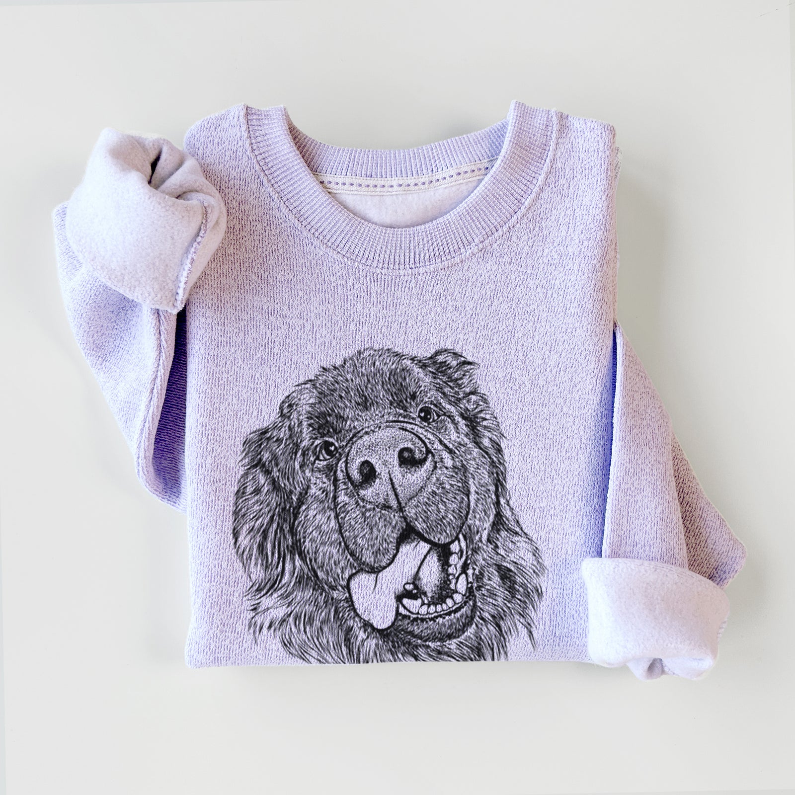 Hand-drawn sketch of Tuna the Newfoundland on an Ice Purple knit sweatshirt