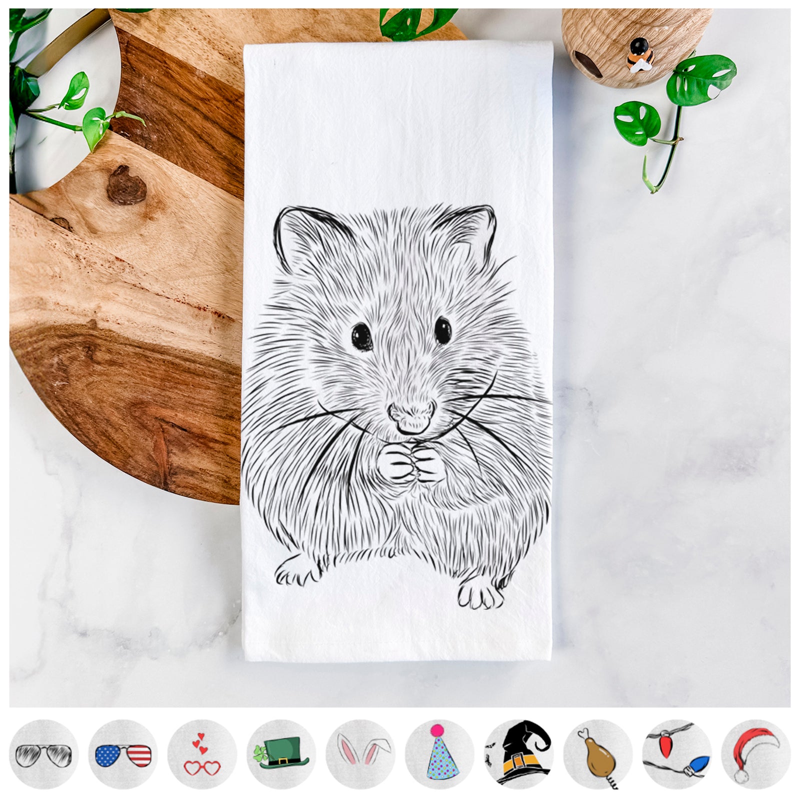 Hand-drawn sketch of Twitch the Hamster on a tea towel, shown with icons of the other available costume styles