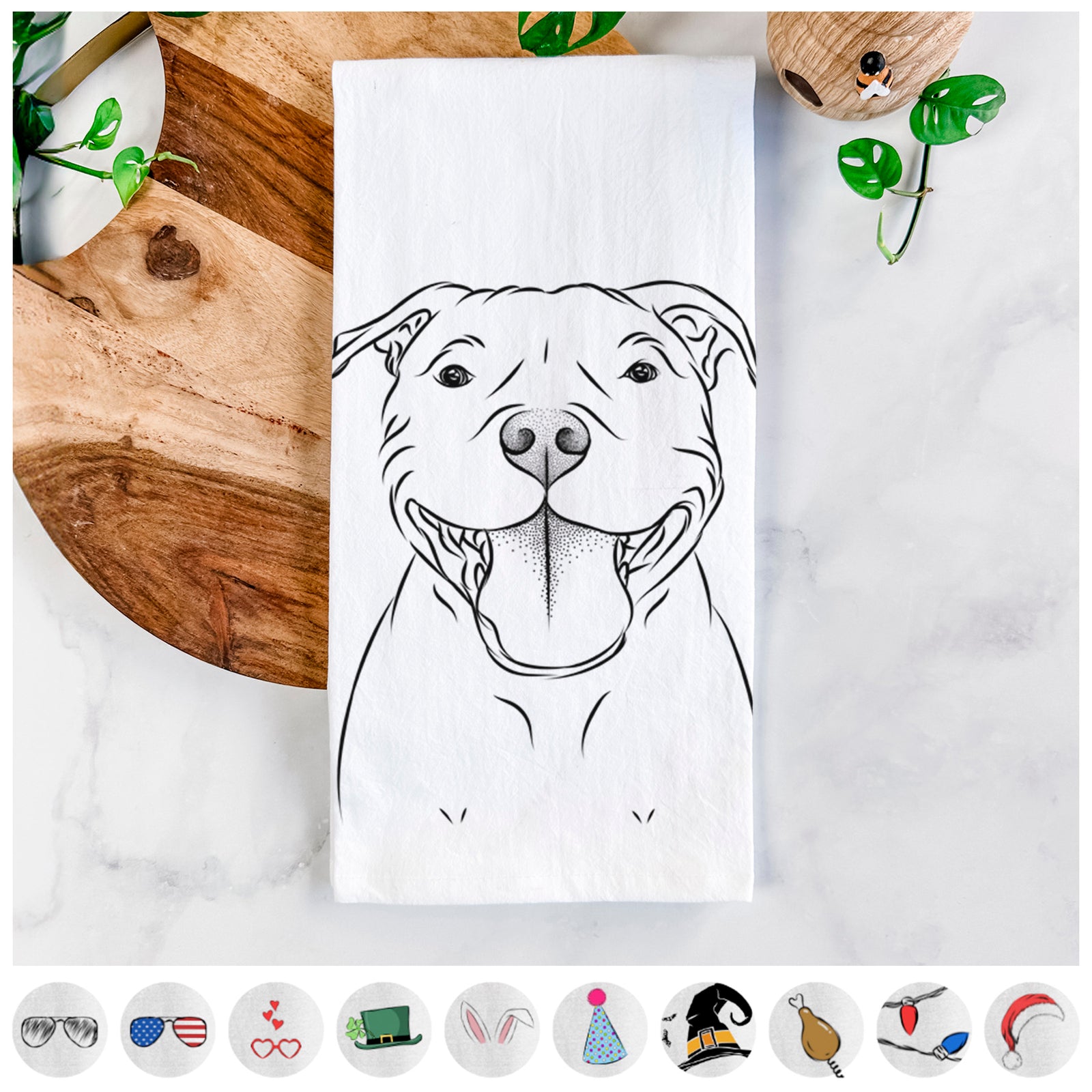 Hand-drawn sketch of Wafer the Staffordshire Bull Terrier on a tea towel, shown with icons of the other available costume styles