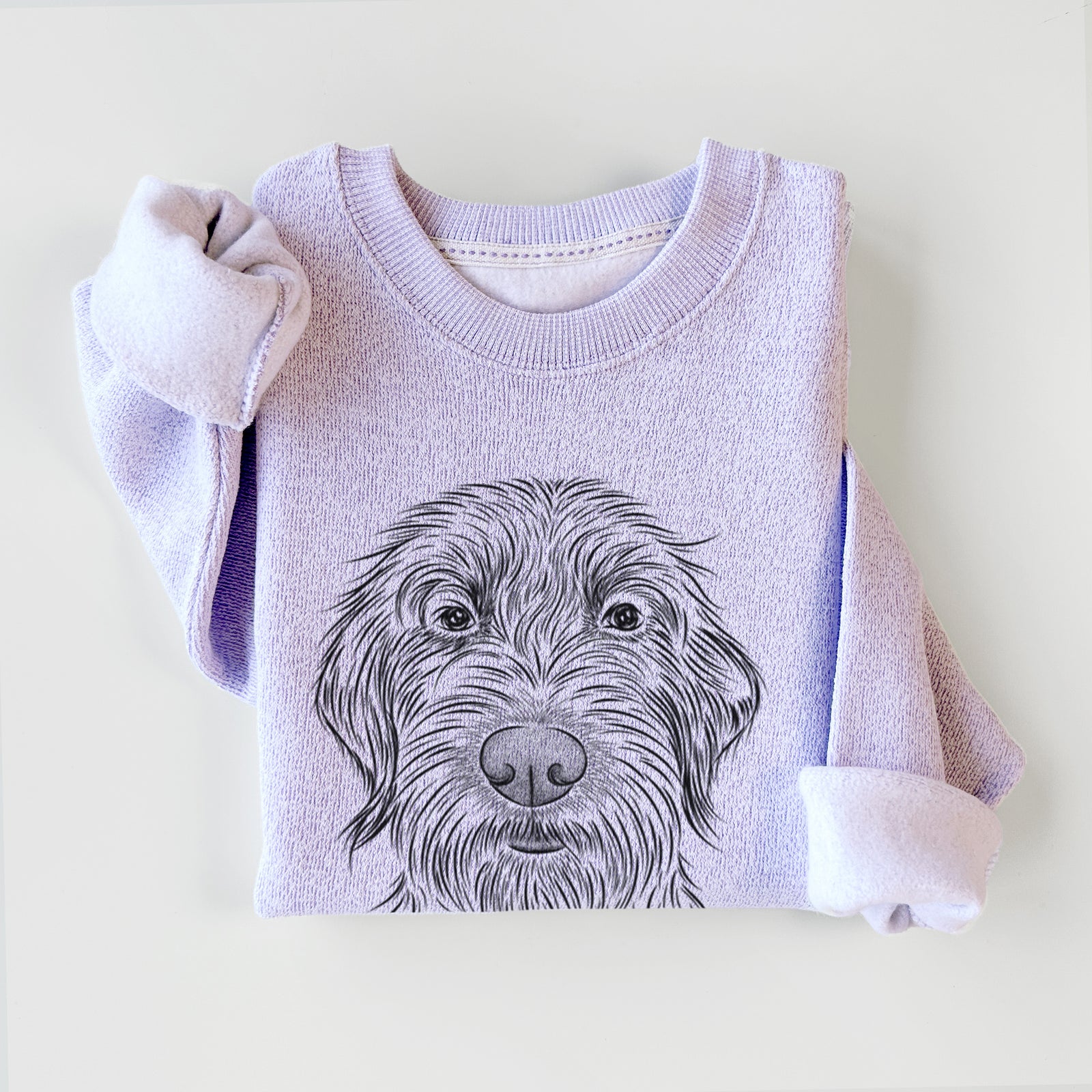 Hand-drawn sketch of Wilkins the Wirehaired Pointing Griffon on an Ice Purple knit sweatshirt