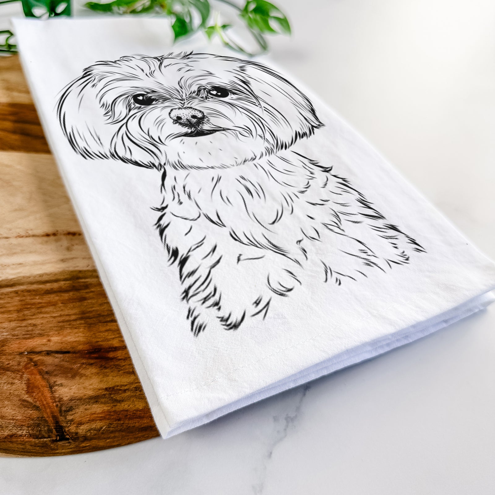 Hand-drawn sketch of Willow the Maltese on a tea towel