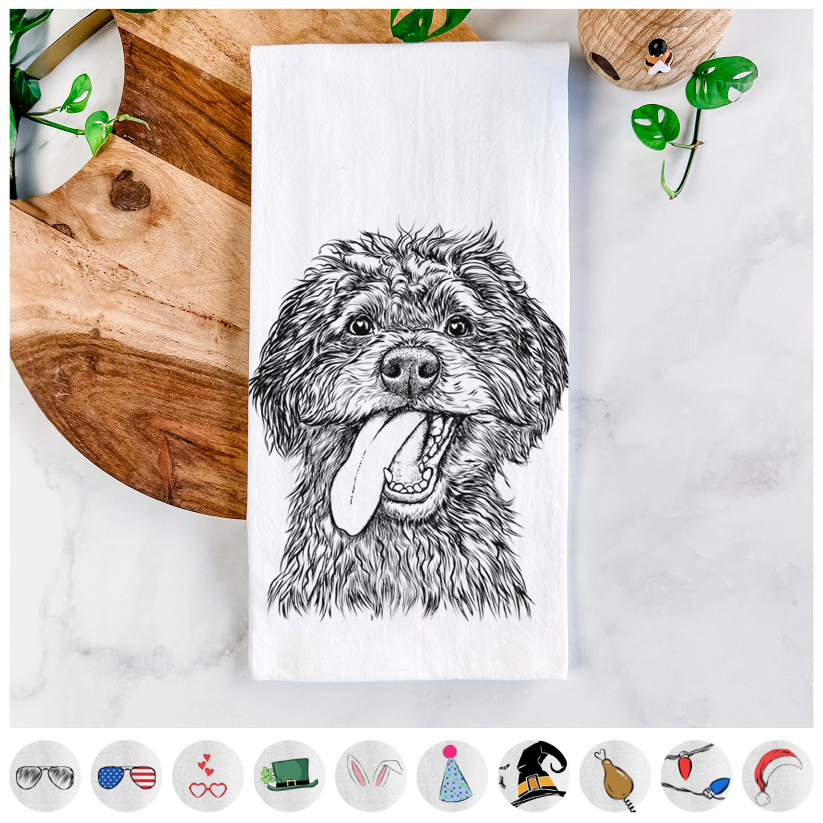Hand-drawn sketch of Winnie the Mini Aussiedoodle on a tea towel, shown with icons of the other available costume styles