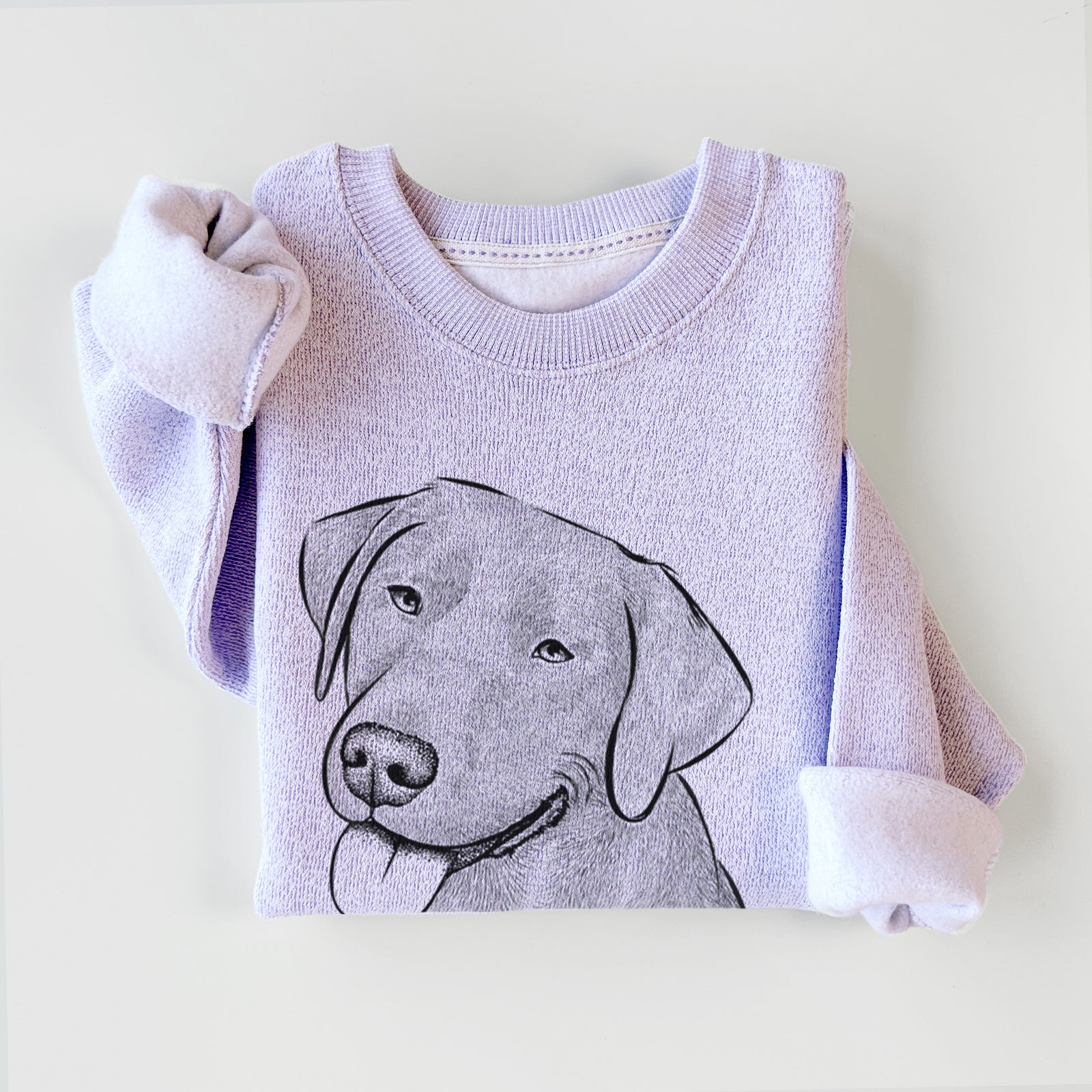Hand-drawn sketch of Zeppelin the Black Labrador on an Ice Purple knit sweatshirt