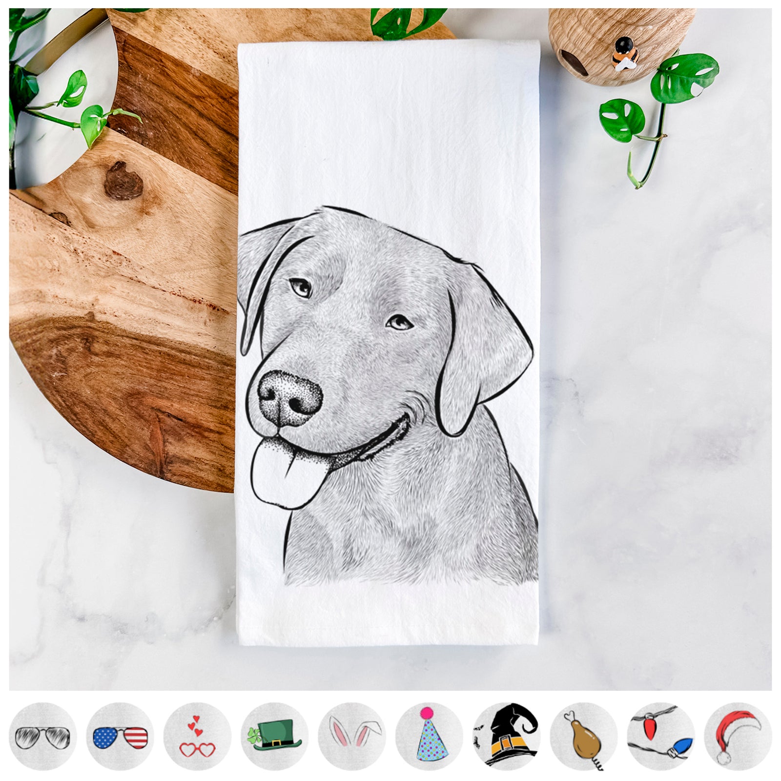 Hand-drawn sketch of Zeppelin the Black Labrador on a tea towel, shown with icons of the other available costume styles