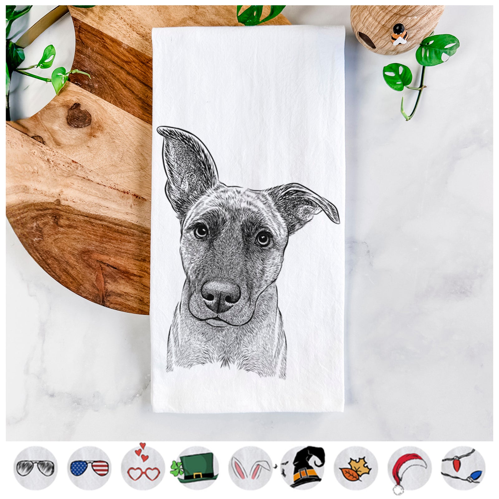 Hand-drawn sketch of Zoey the Mixed Breed on a tea towel, shown with icons of the other available costume styles