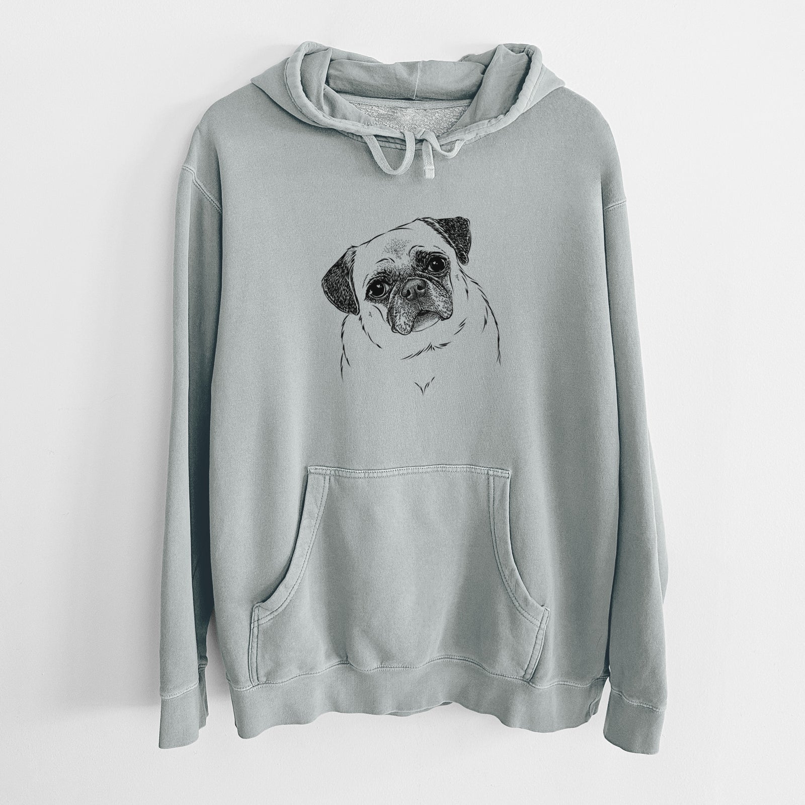 Hand-drawn sketch of Zoey the Pug on a Sage Unisex pigment dyed hoodie