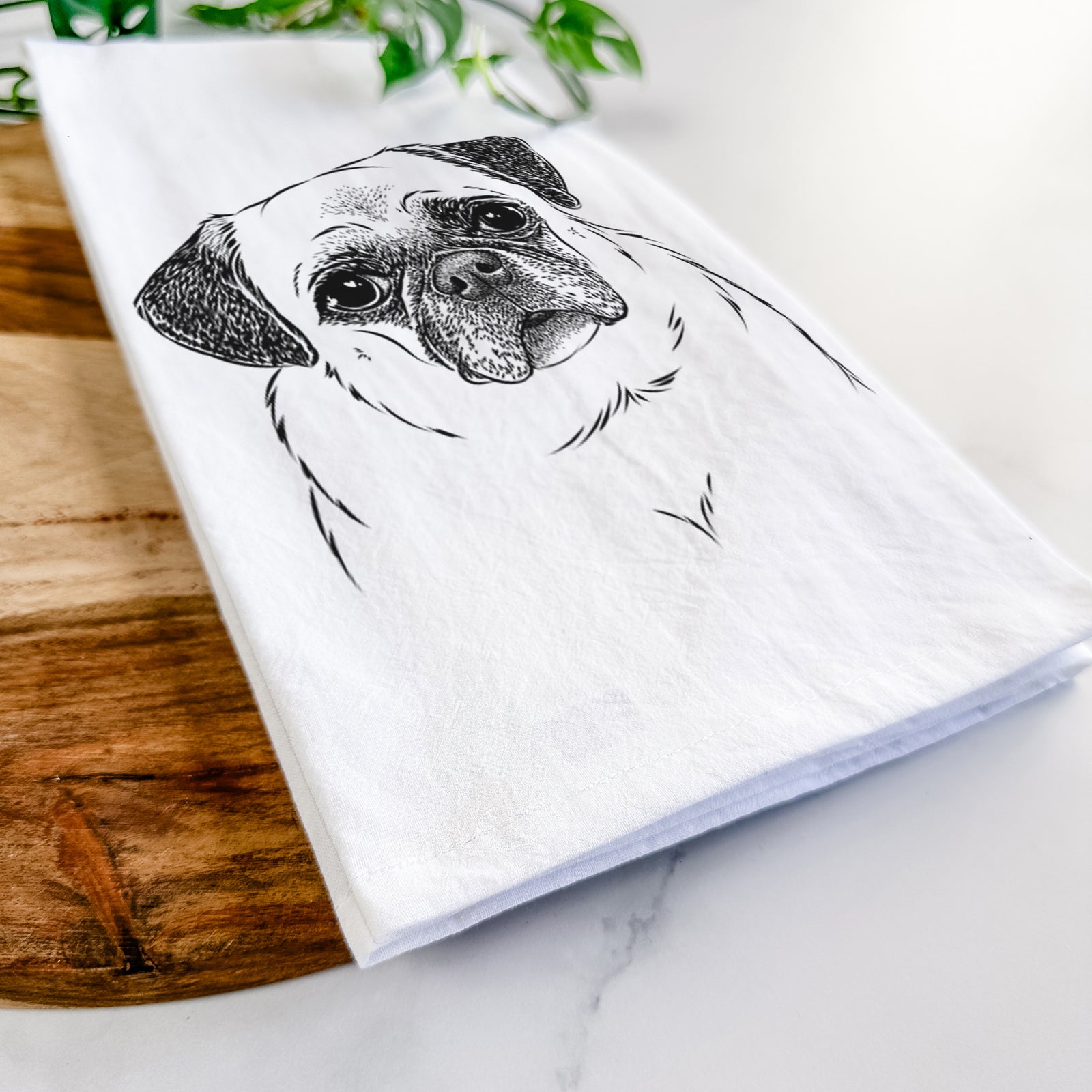 Hand-drawn sketch of Zoey the Pug on a tea towel