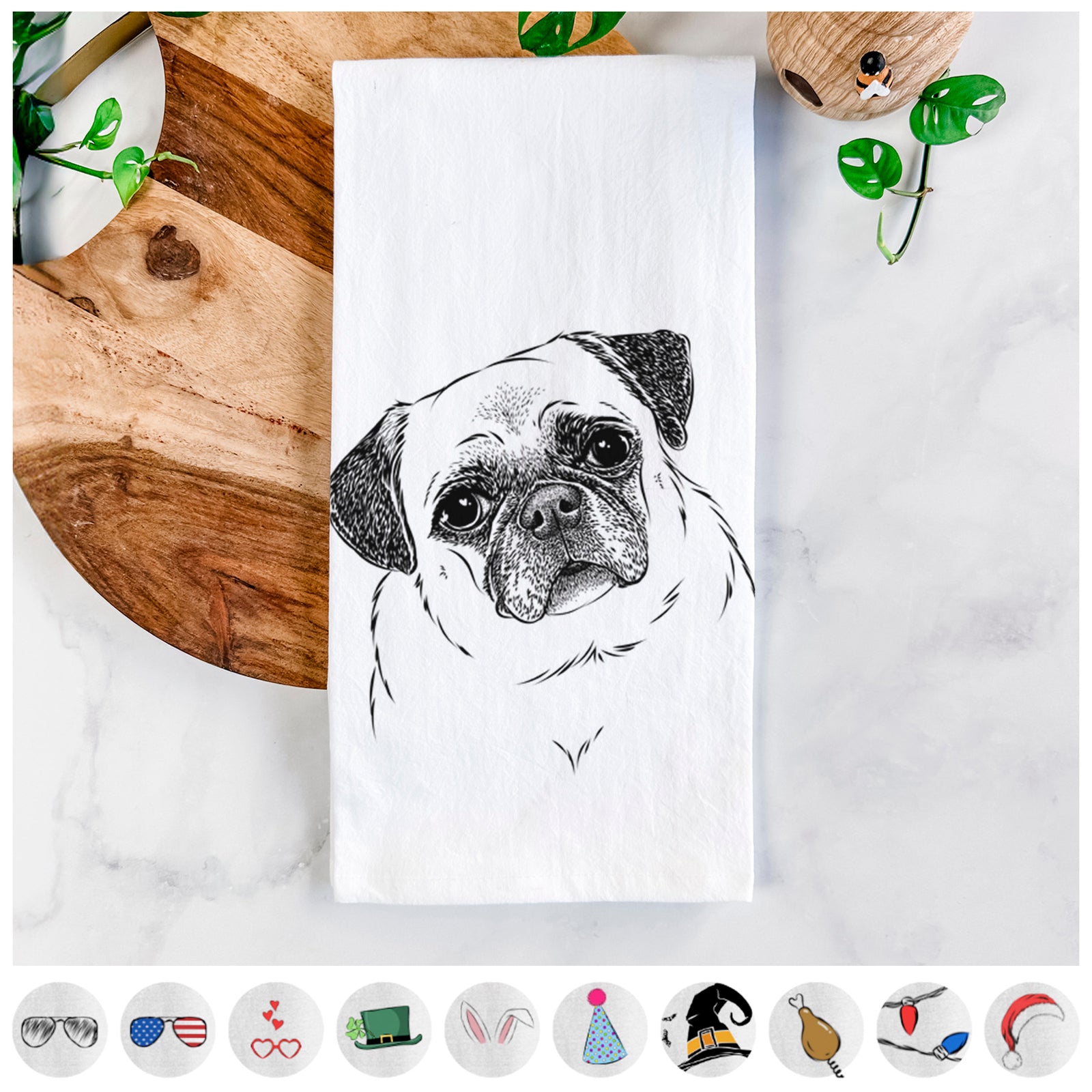 Hand-drawn sketch of Zoey the Pug on a tea towel, shown with icons of the other available costume styles
